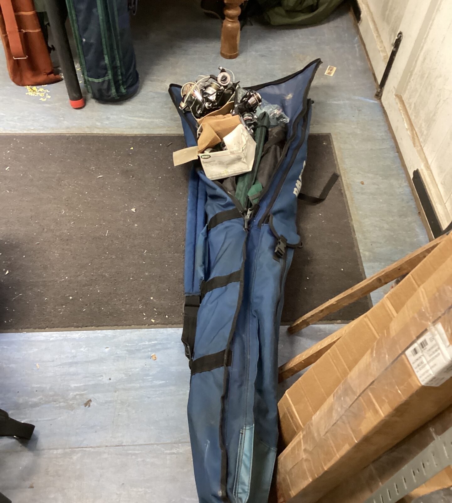 Daiwa Fishing Bag of fishing items inc reels and rods