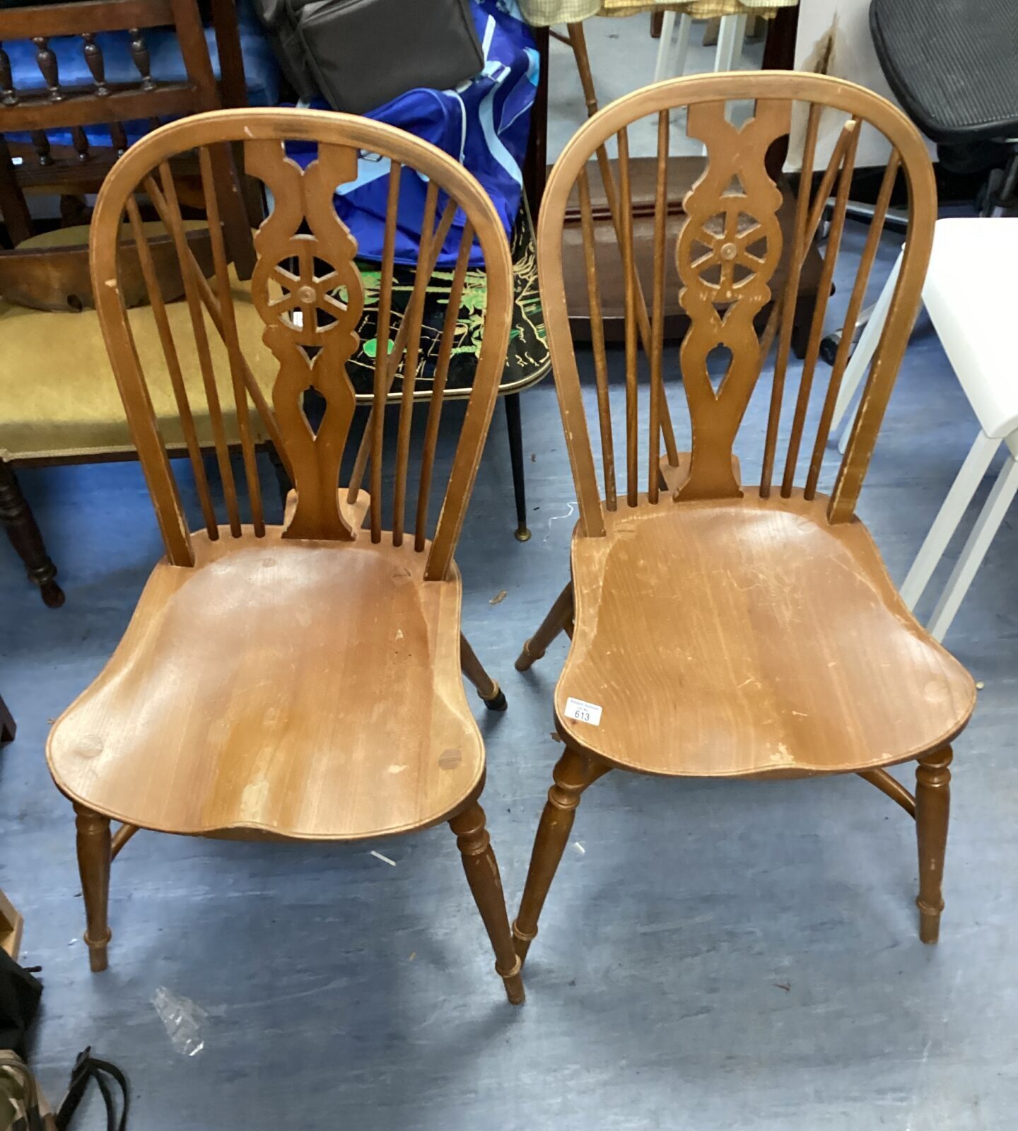 Two vintage ercol wheelback chairs