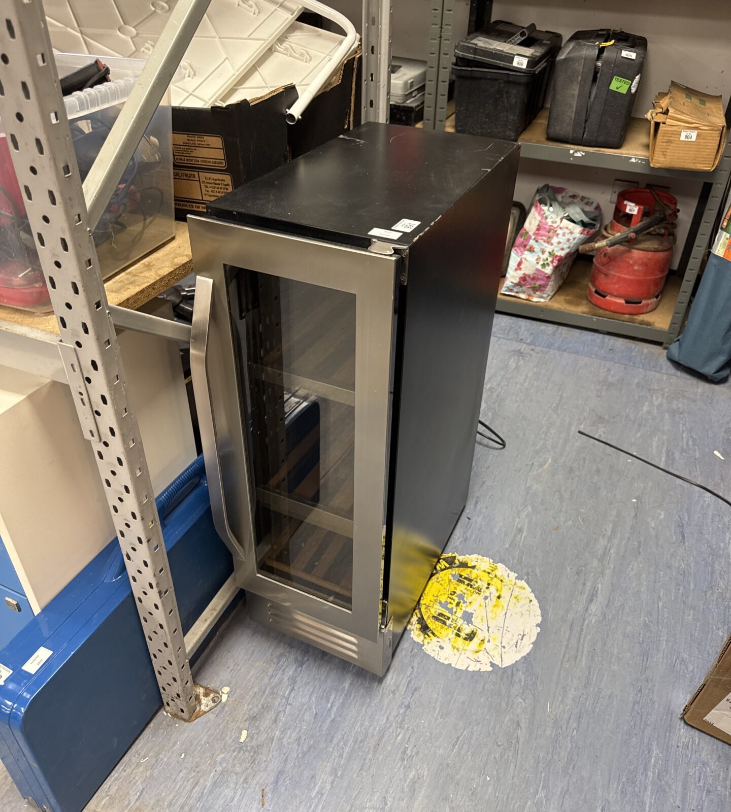 John Lewis wine cabinet - powers on when plugged in, has cosmetic marks