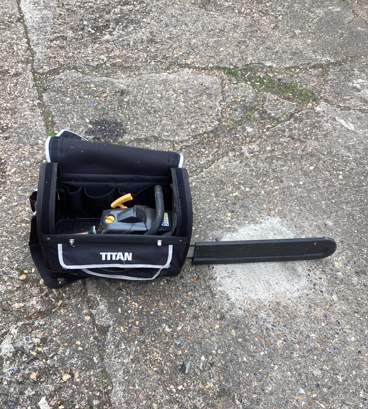Titan Petrol Chainsaw in case