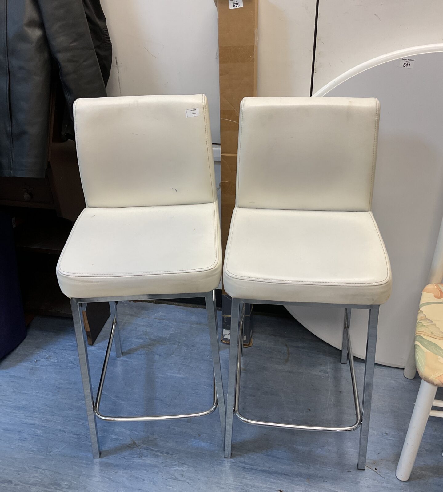 Pairbof bar stools with white leatherette top & chrome legs