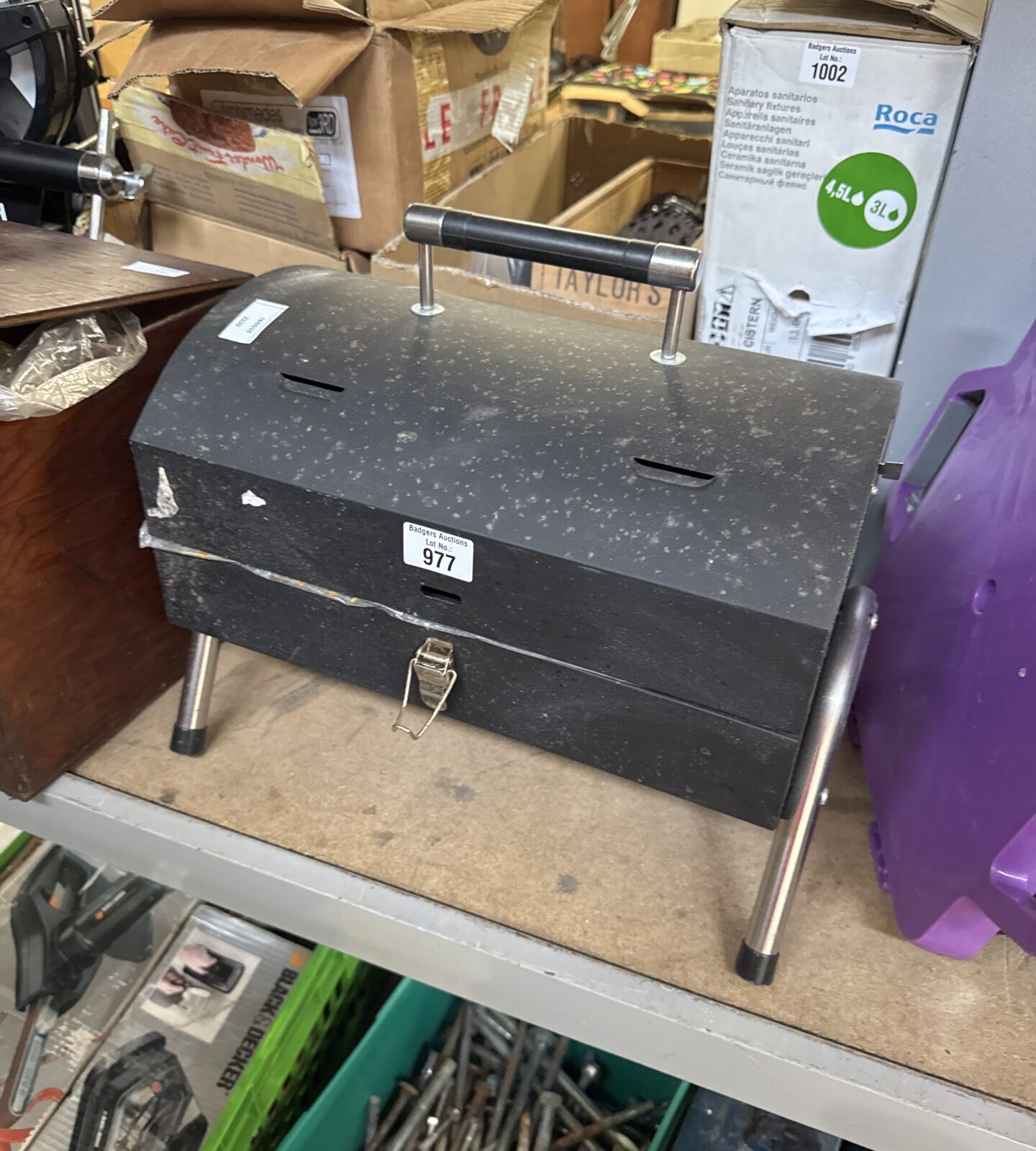 Small barbecue on legs - appears unused
