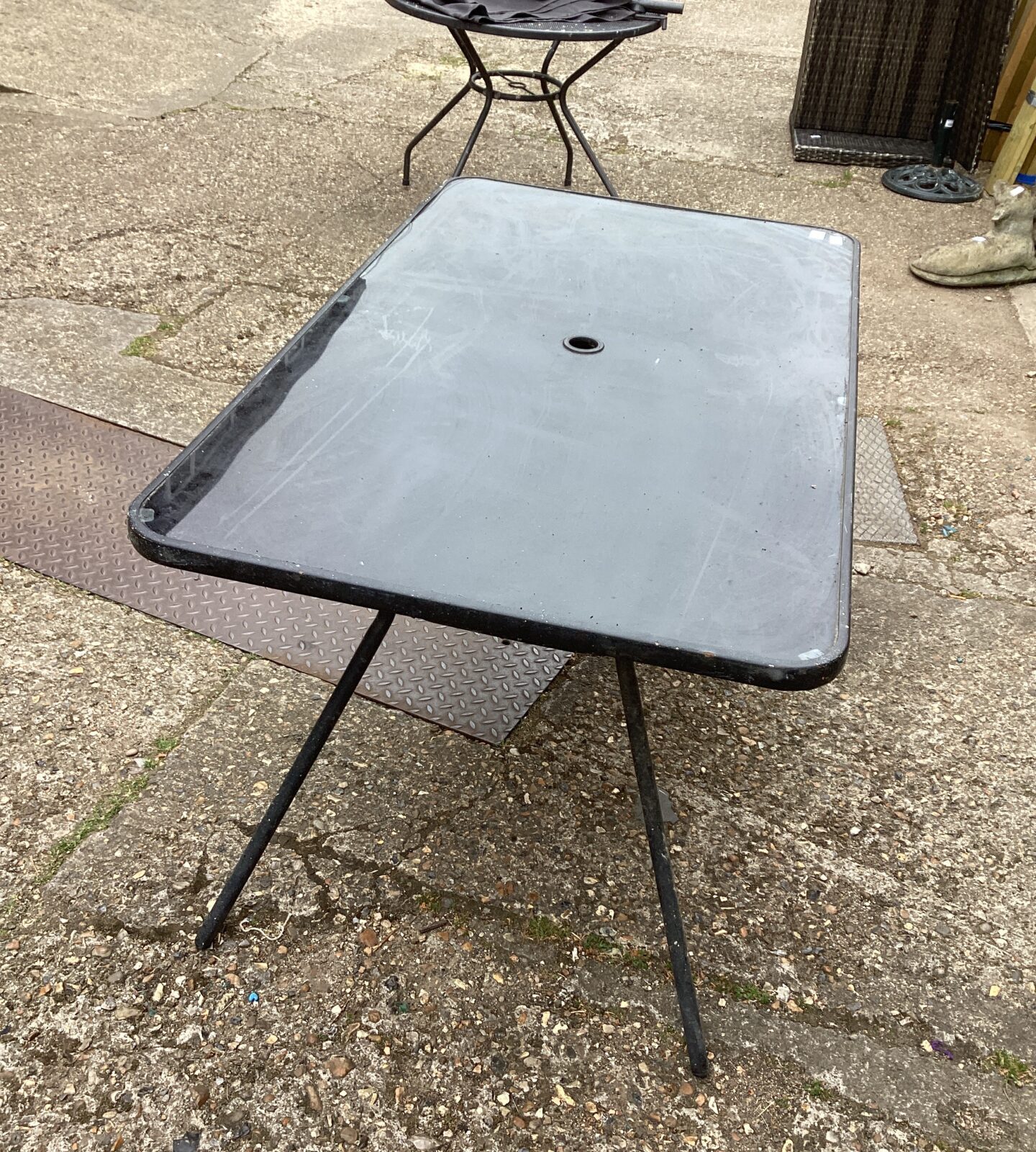 Large glass topped garden table