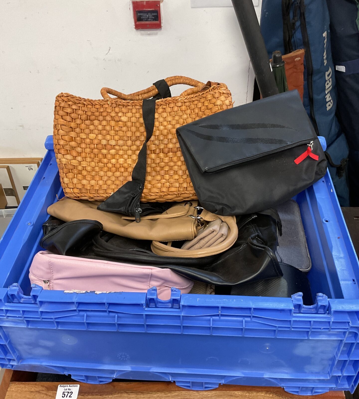 Large crate full of ladies bags