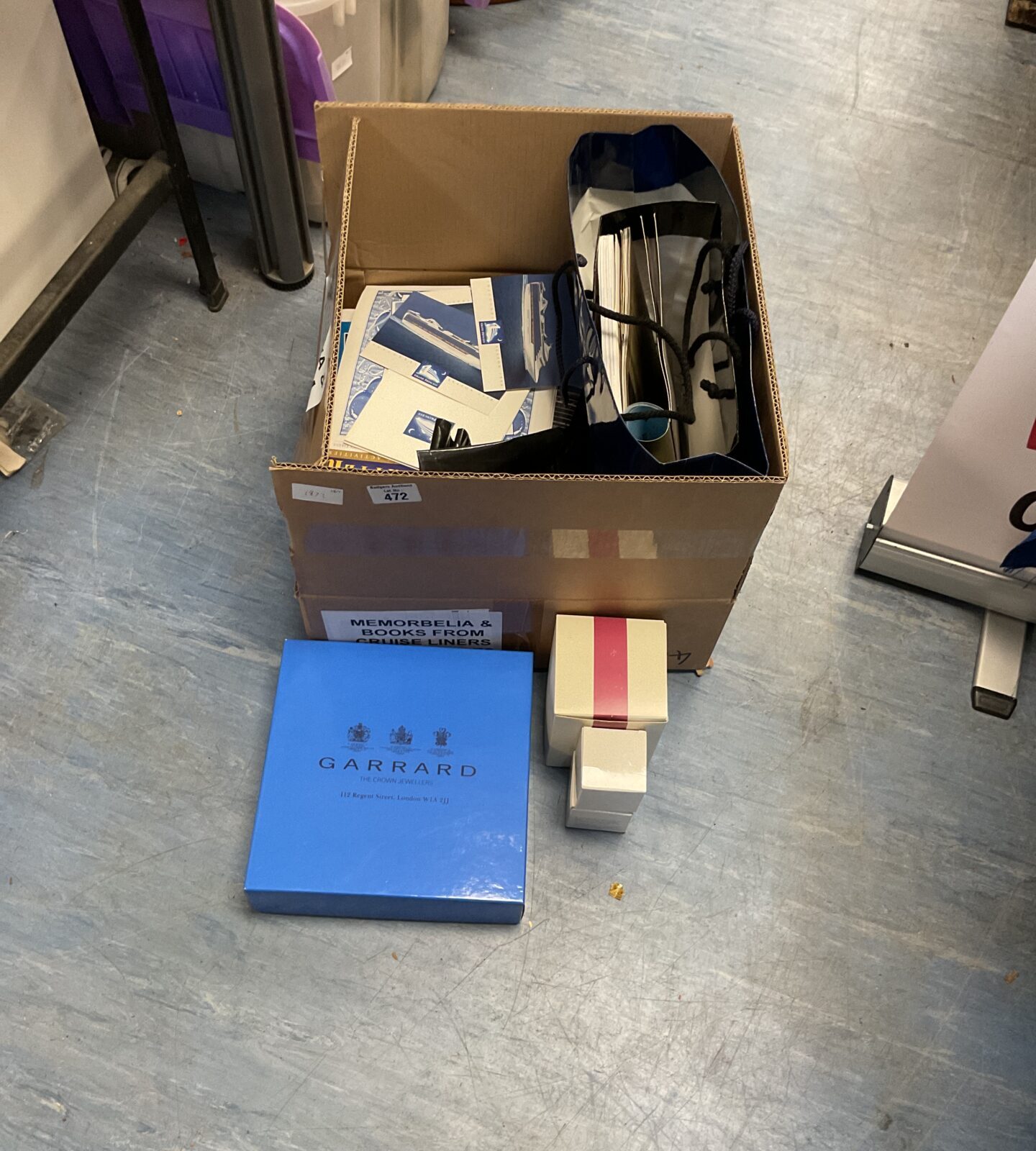 Box of mixed inc cruise ship books, garrard plate and gift bags