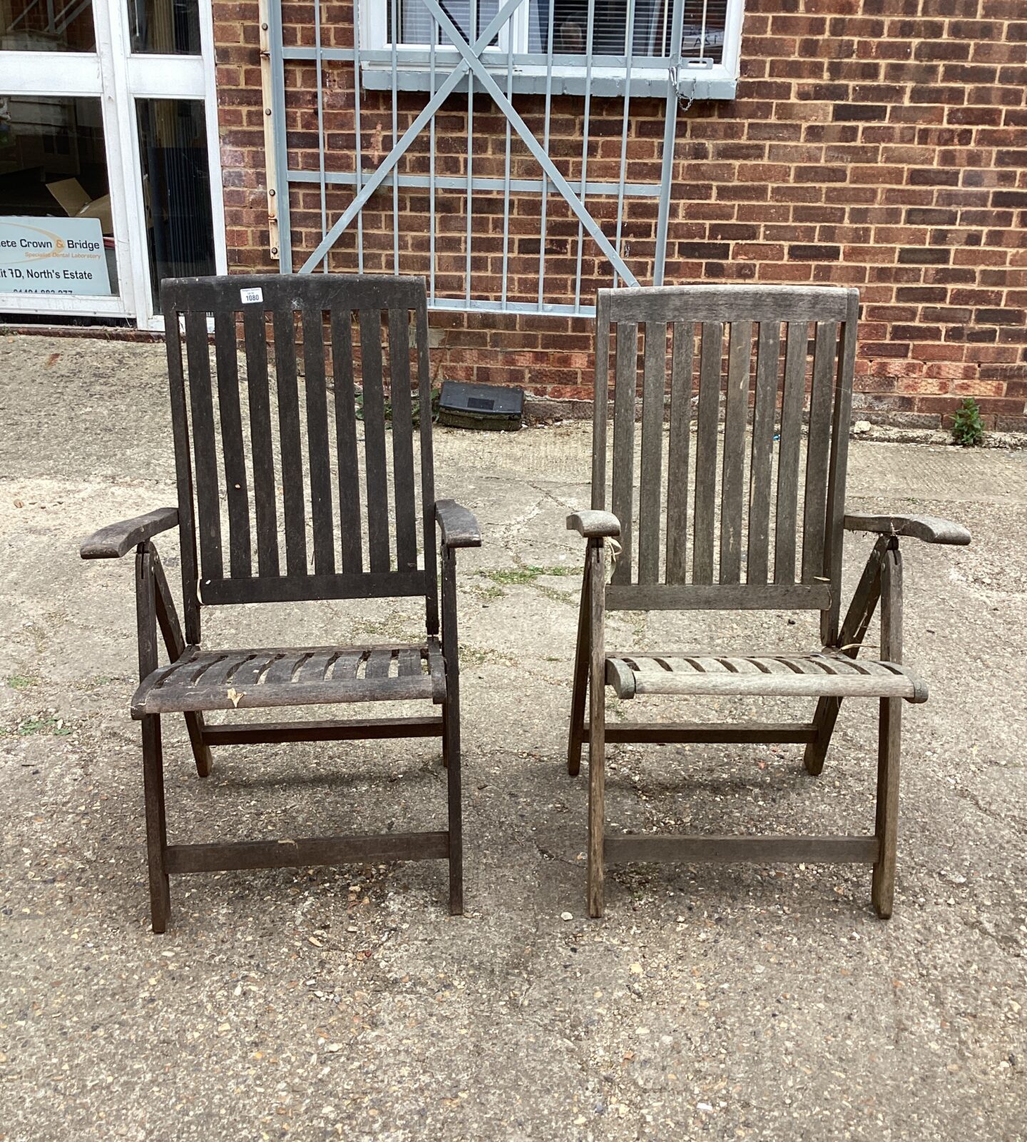 Two hardwood garden chairs