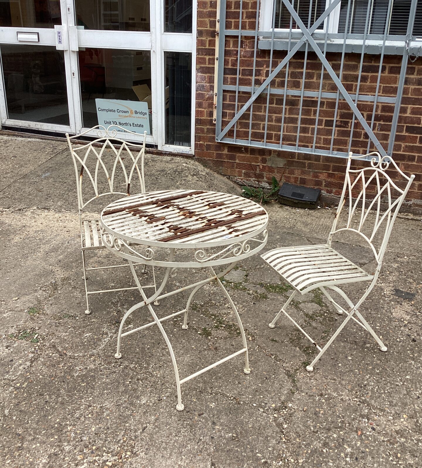 Metal garden table and two chairs