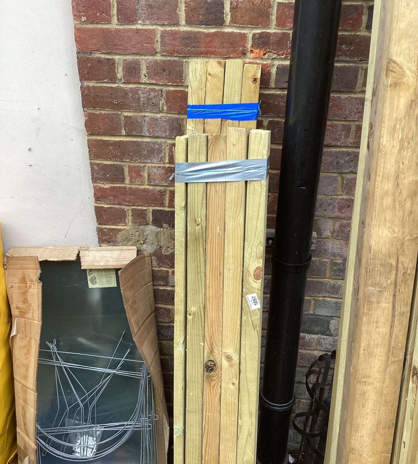 Three bundles of timber 4’