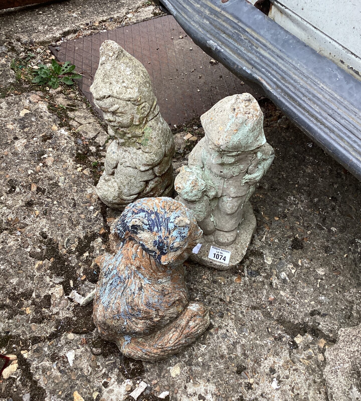 Three garden ornaments inc cat