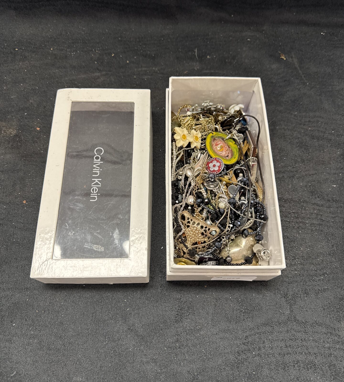 Small box of costume jewellery
