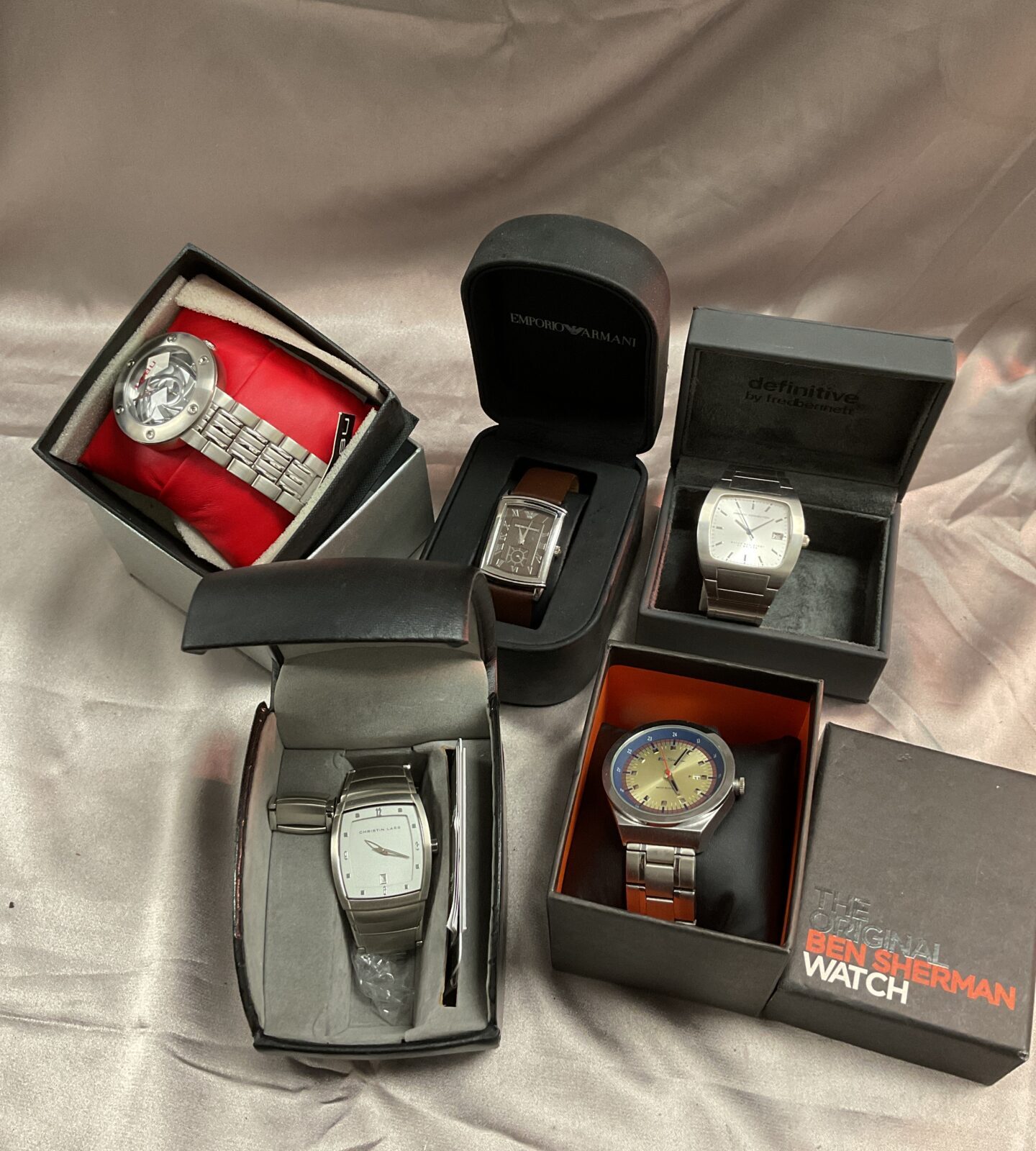 Five boxed wristwatches