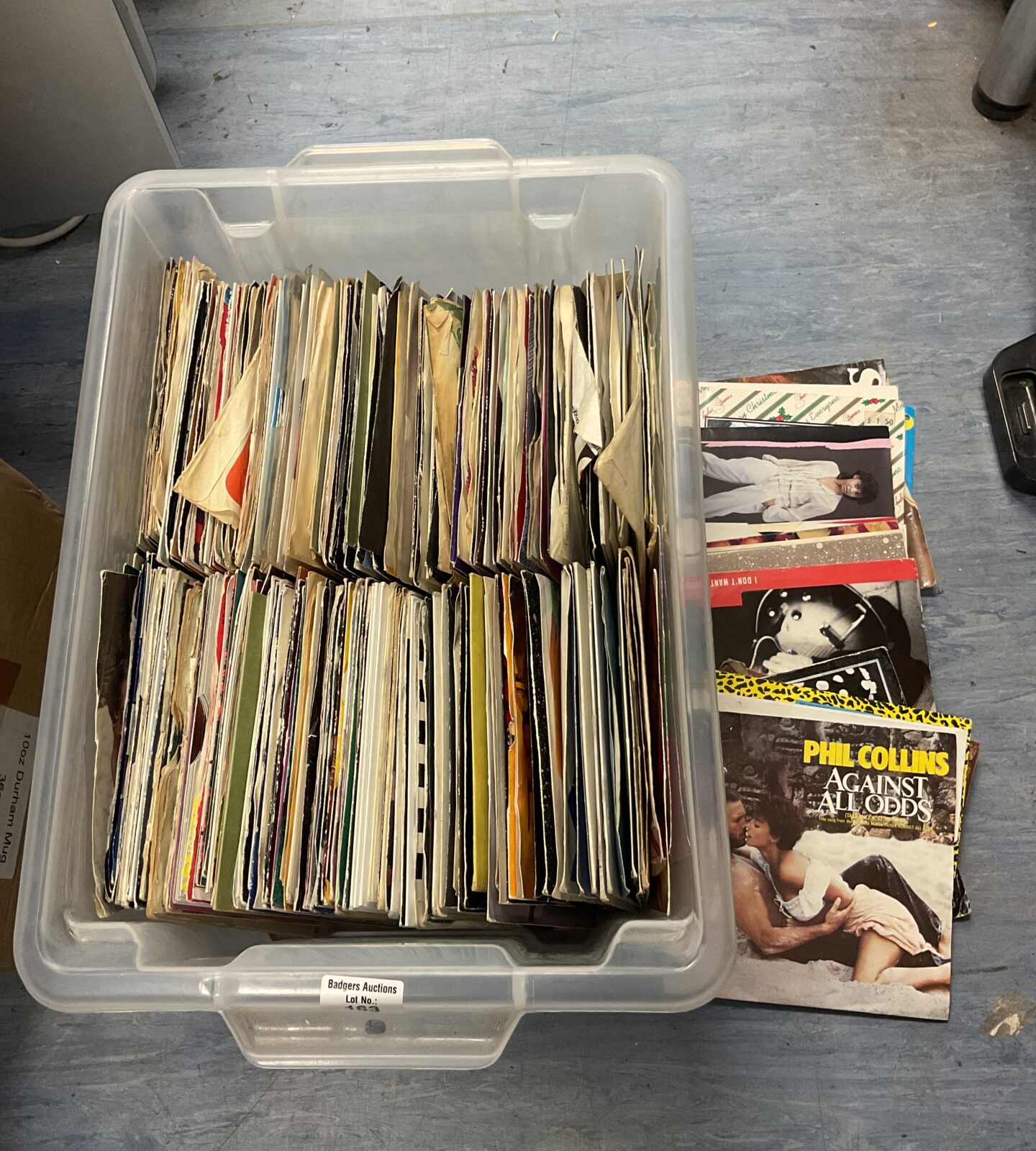 Box of 7” single vinyl records