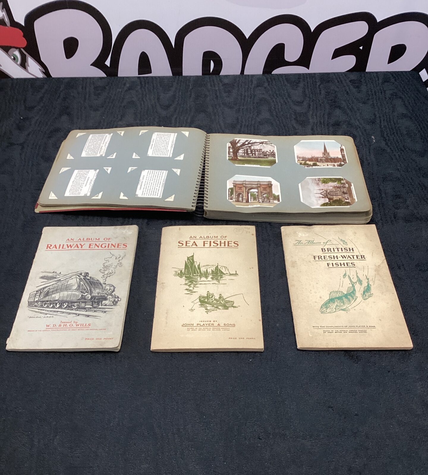 Four cigarette card albums inc sea fishes & railway engines