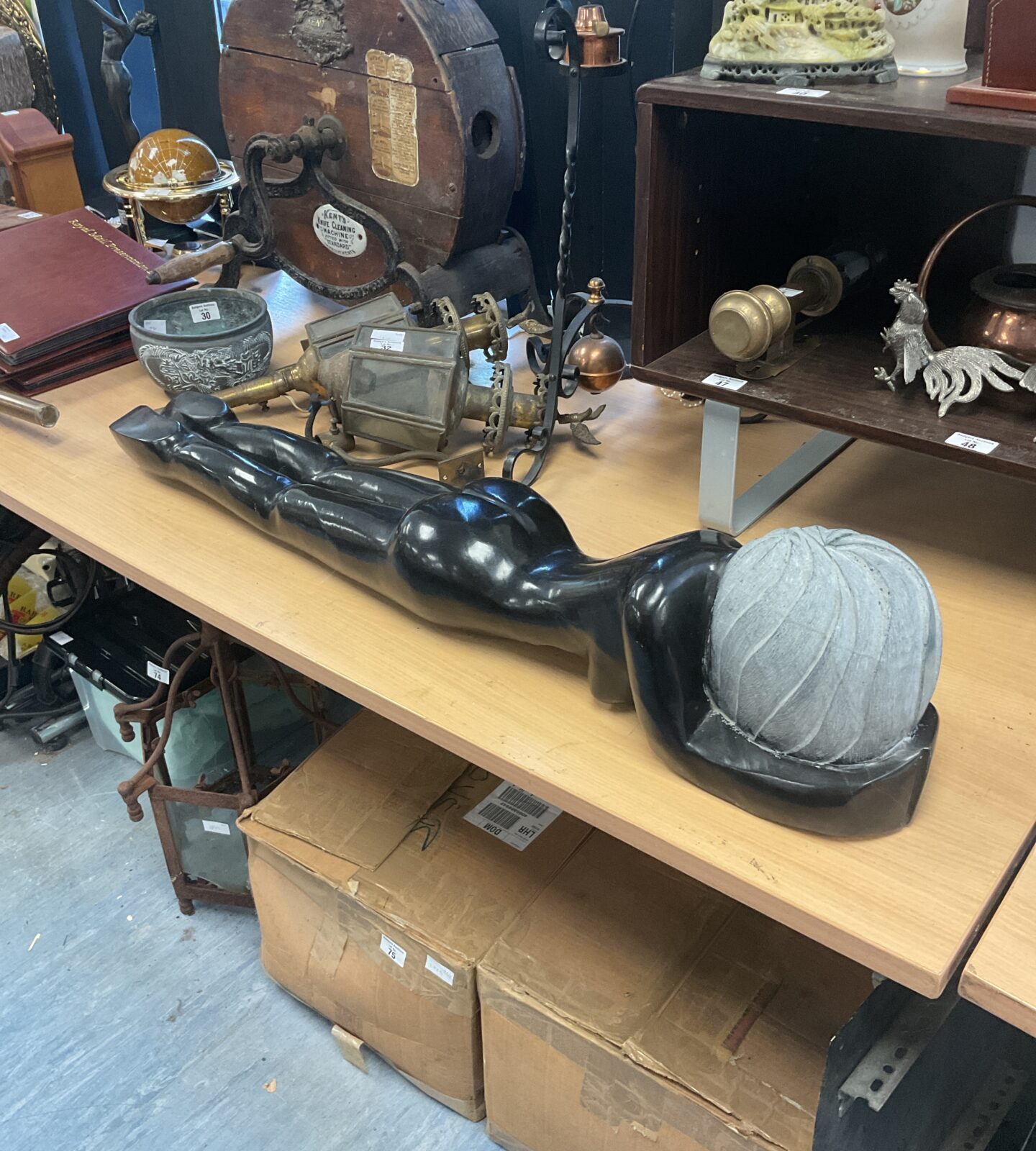 Zimbabwe shana stone sculpture of a lady laying down
