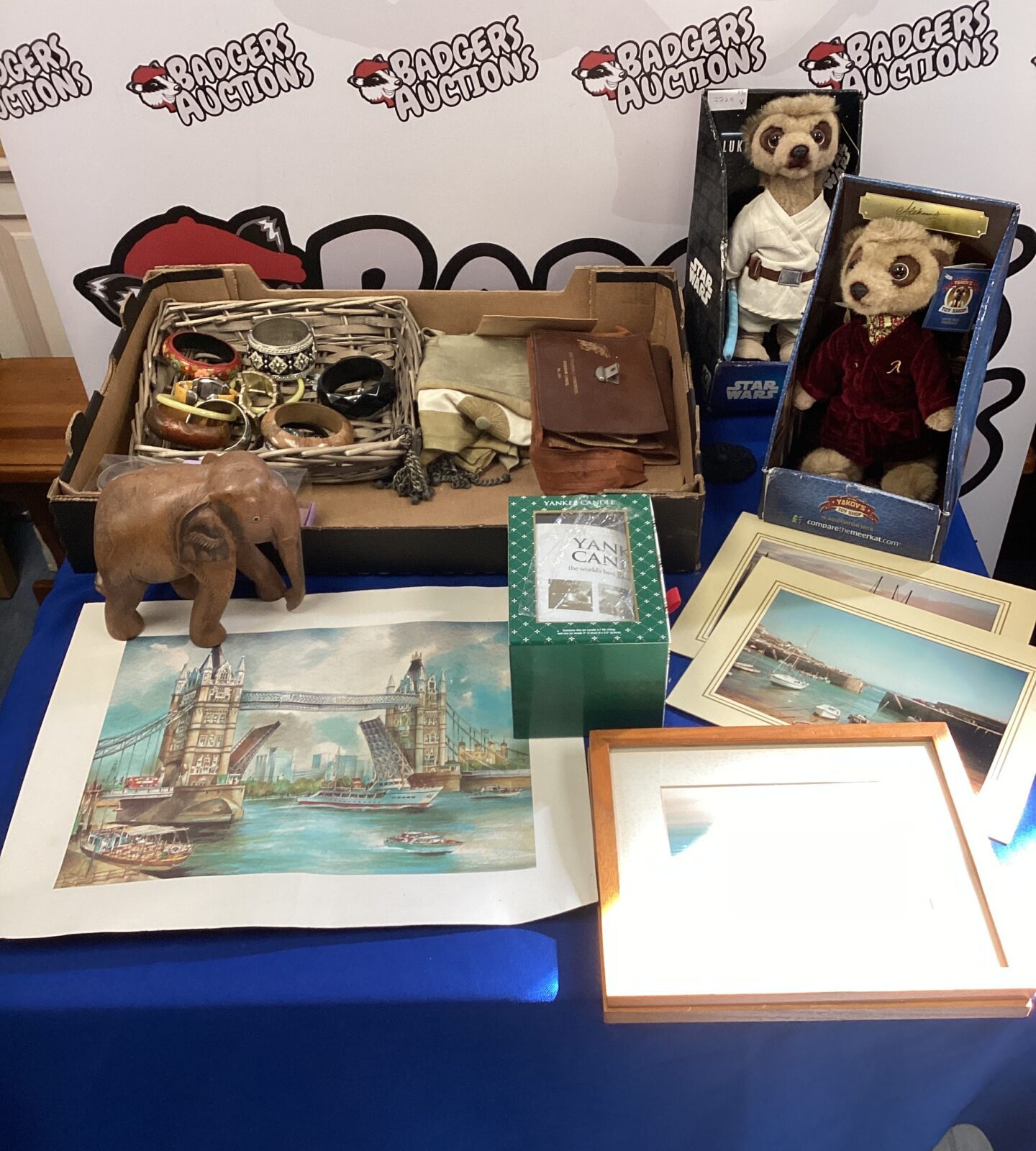 Tray of mixed inc compare the meerkat toys, bundle of bangles & framed photos
