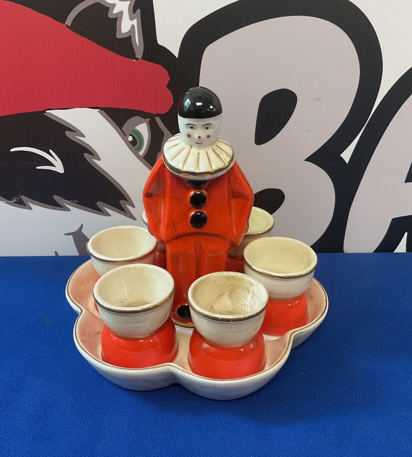 Art deco clown egg holder set