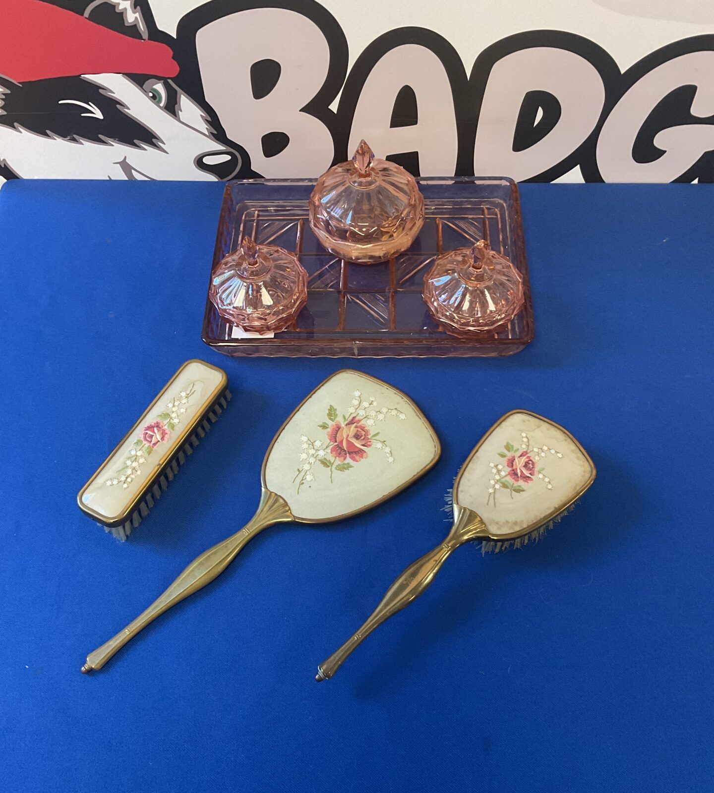 Vintage pink glass dressing table set with brass embroidered brushes & mirror