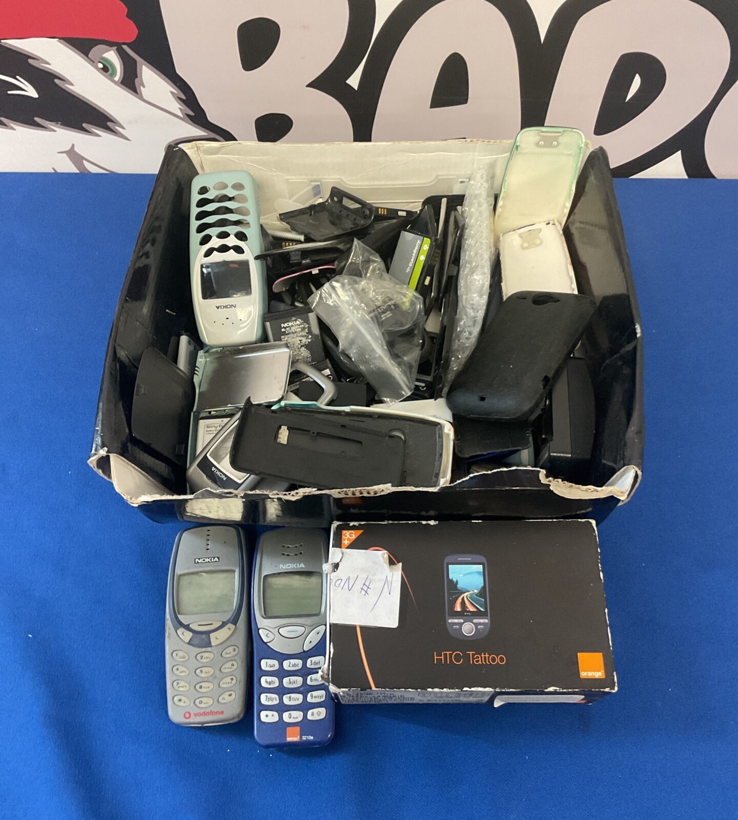 Box of retro mobile phones & batteries including nokia