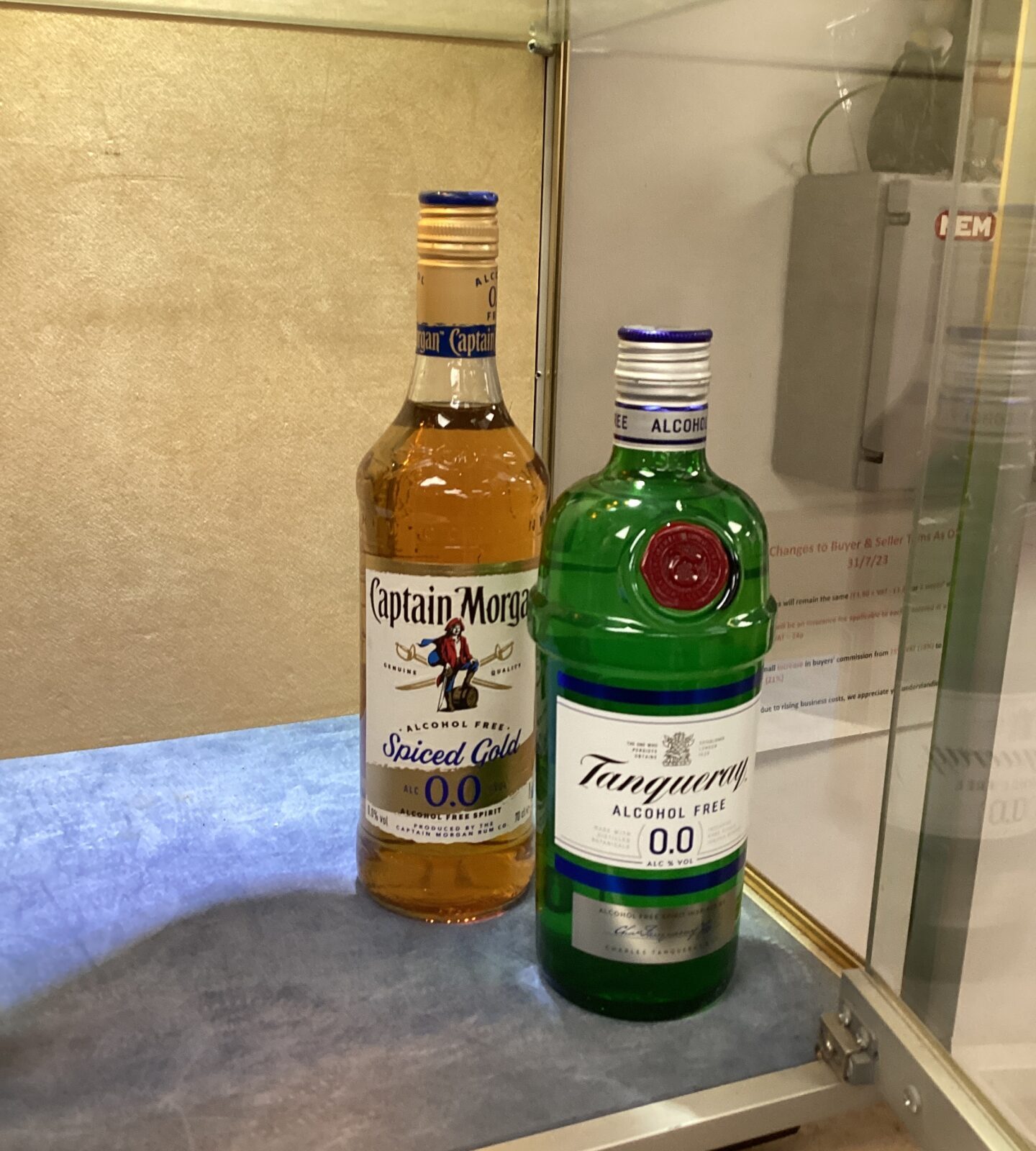 Two bottles of 0% Alc Rum and Tanqueray