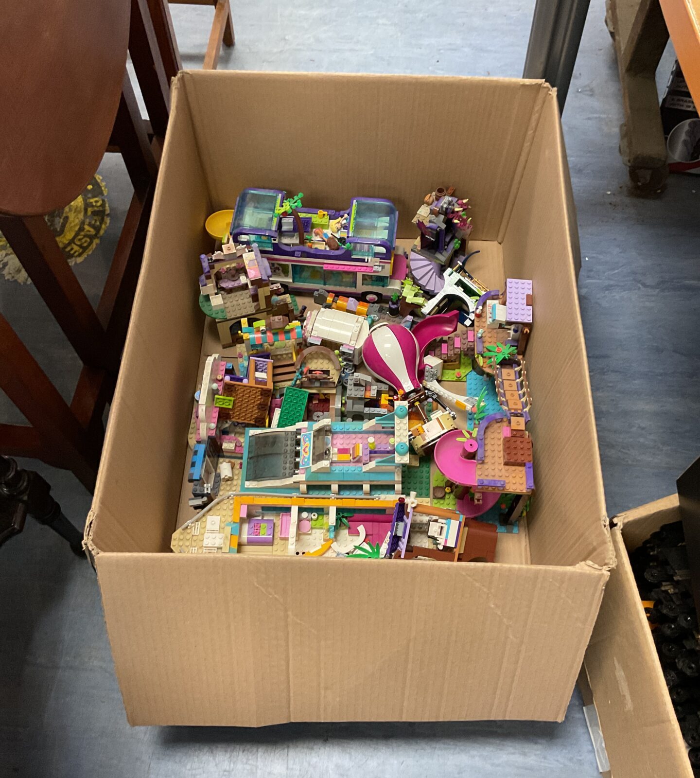Box of lego friends sets and parts