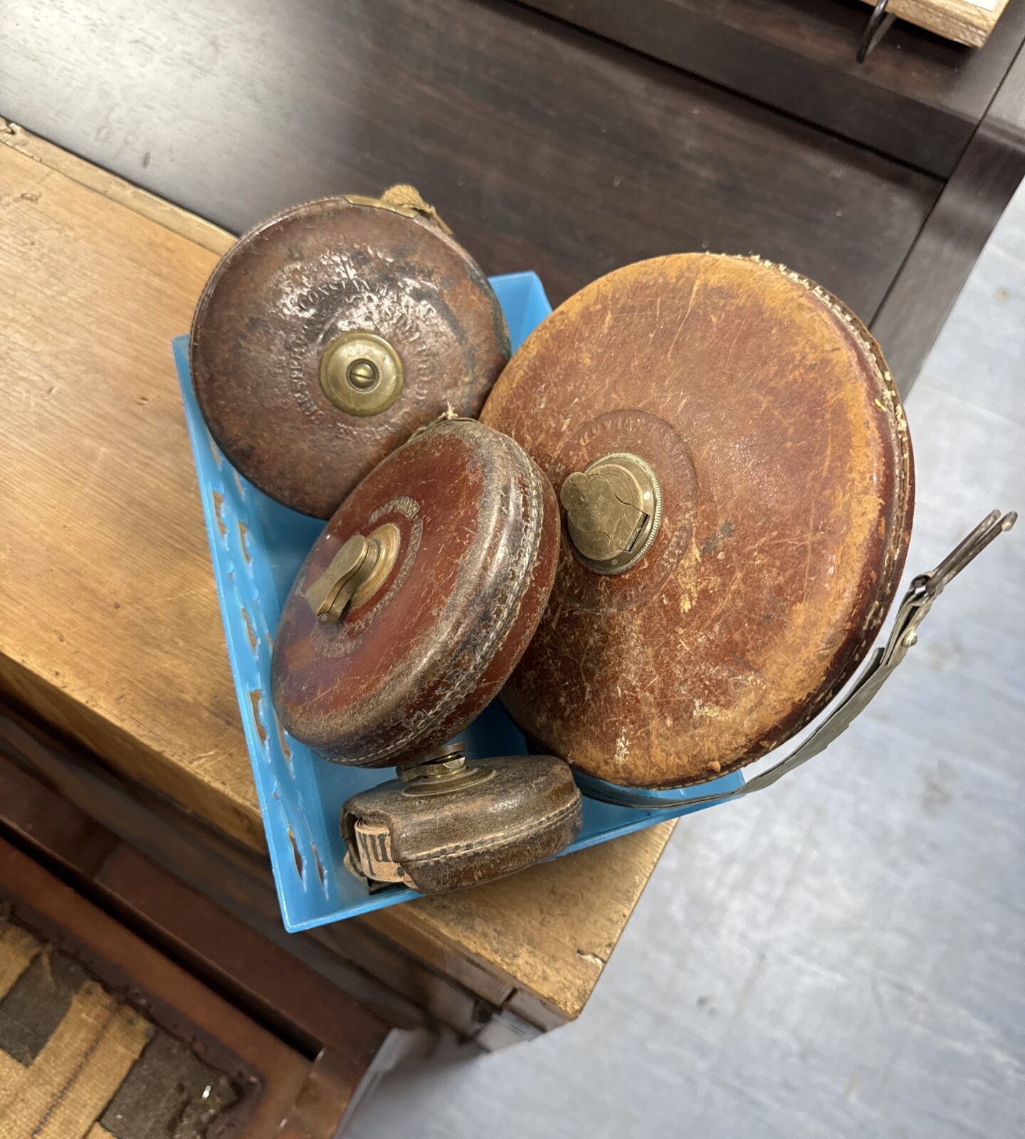 Four vintage tape measures inc chesterman