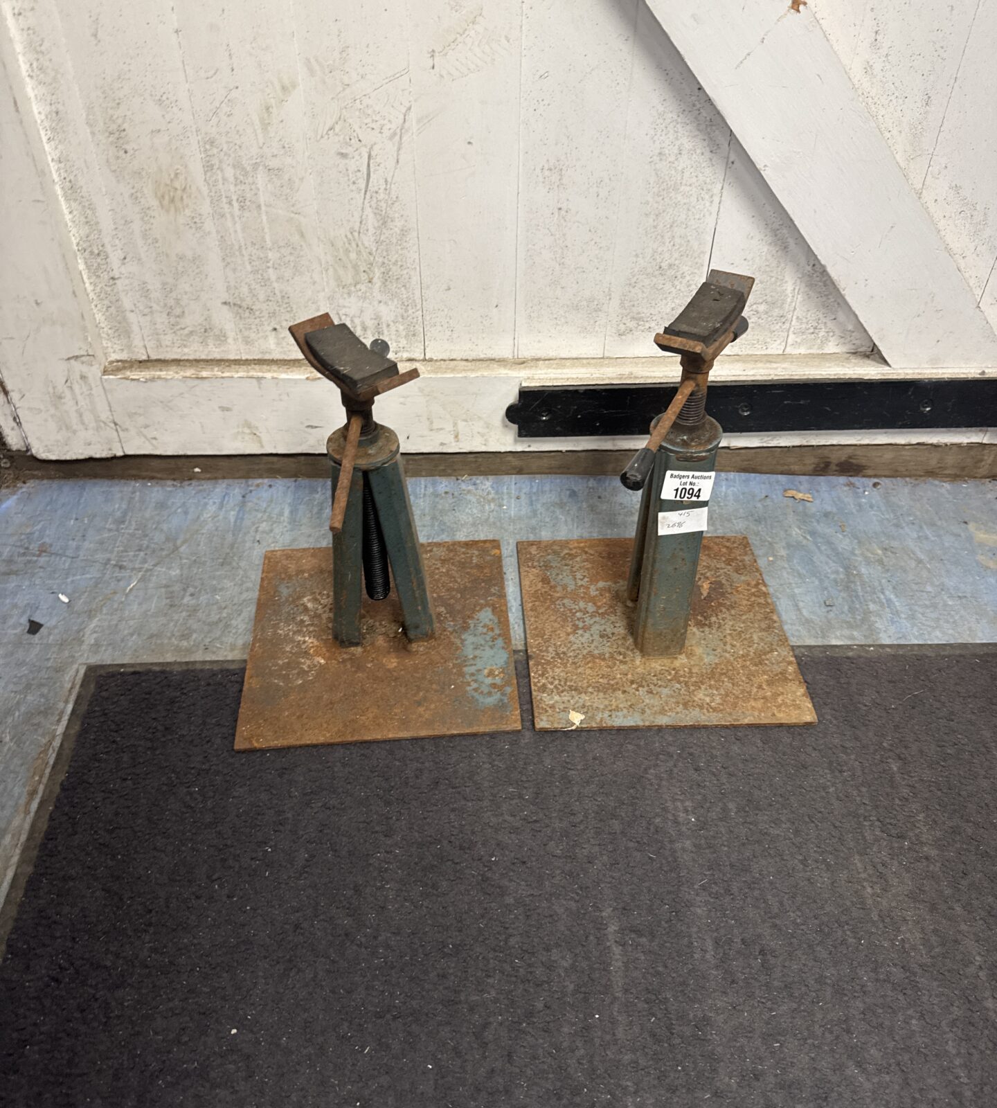 Two vintage wind up axle stands