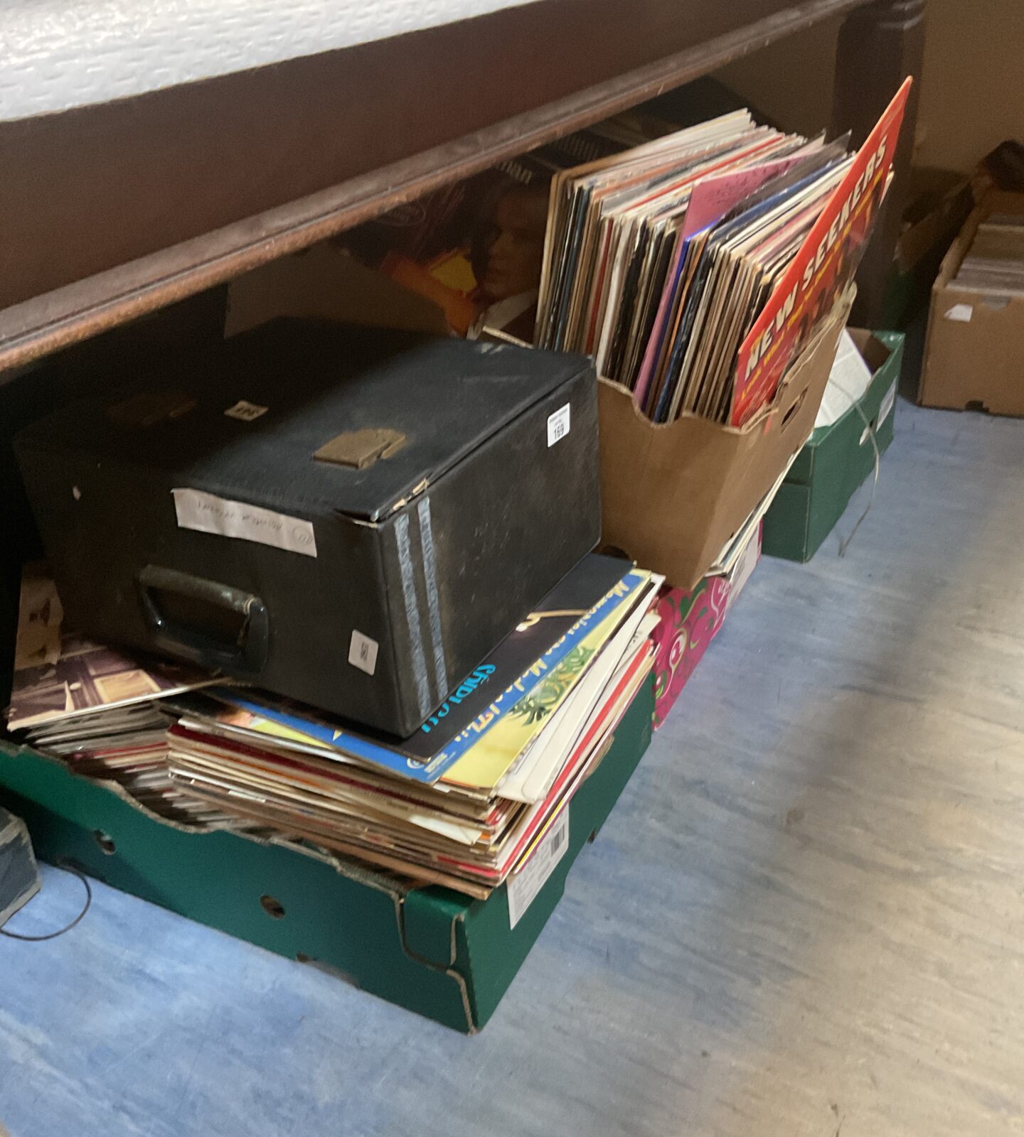 Five boxes full of 12” vinyl records
