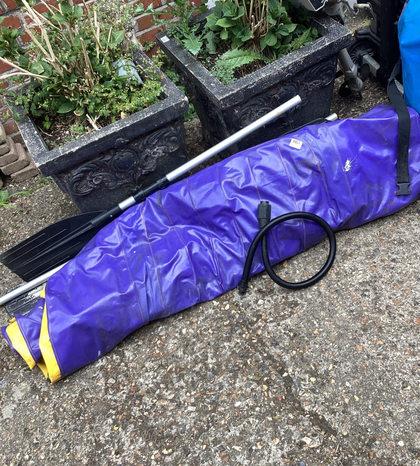 Inflatable dingy with paddles
