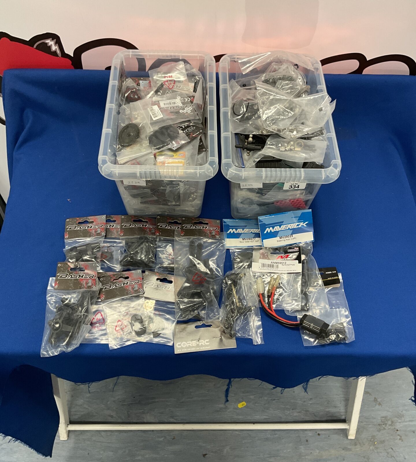 Two boxes of mixed new model rc parts and accessories inc basher