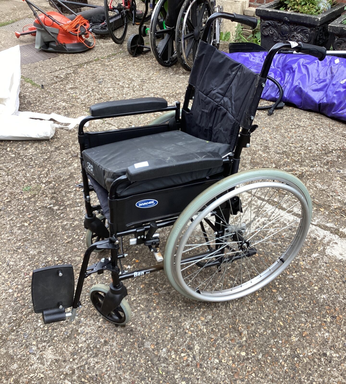 Invacare folding wheelchair with cushion