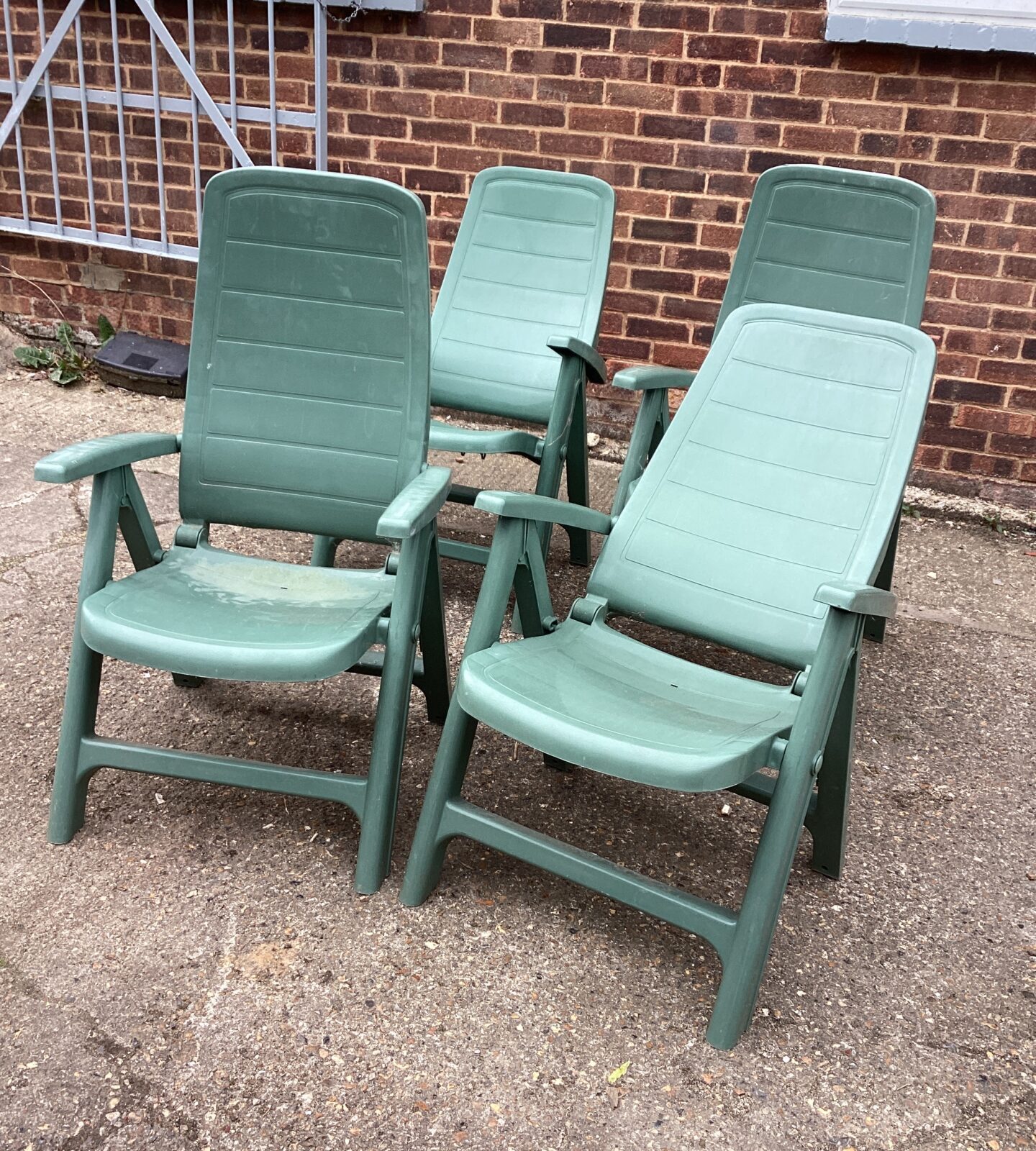Four plastic Recliner Garden Chairs