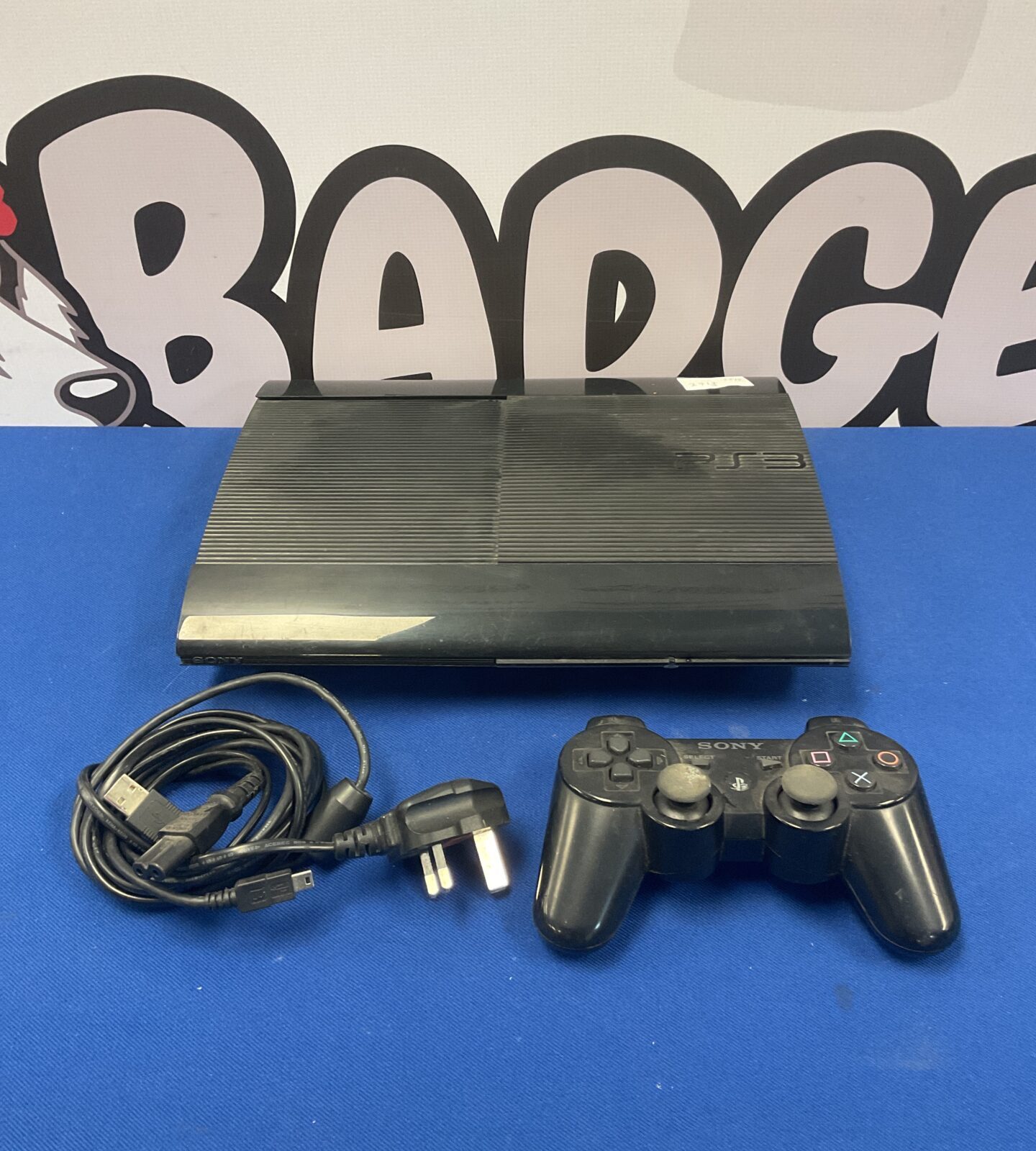 Sony PlayStation 3 super slim console & controller