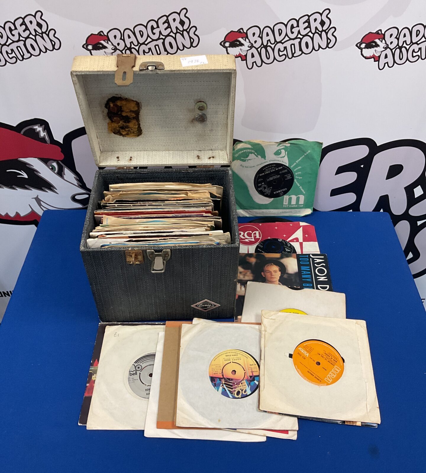 Collection of 7” single vinyl records in case