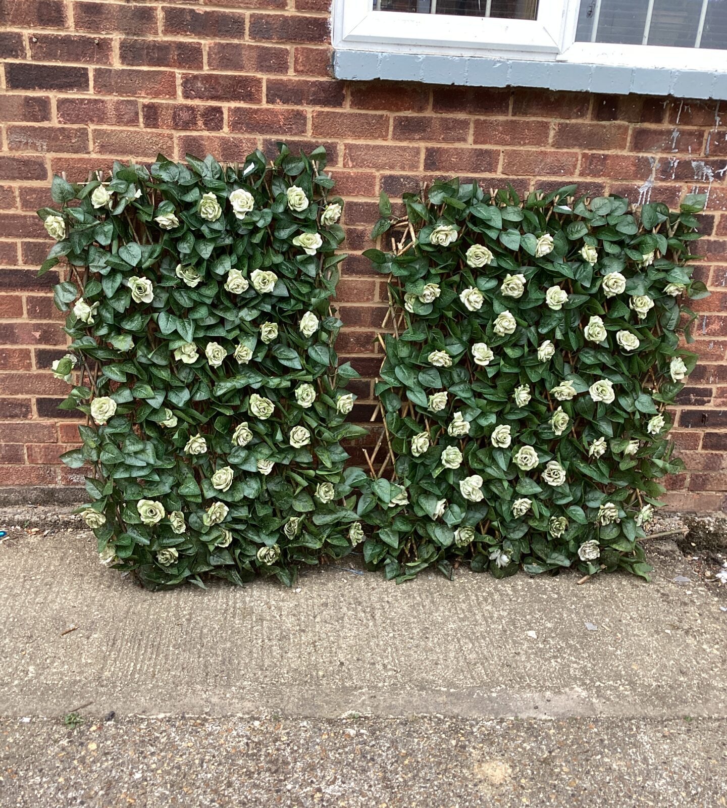 Two Rose bin screening hedge panels