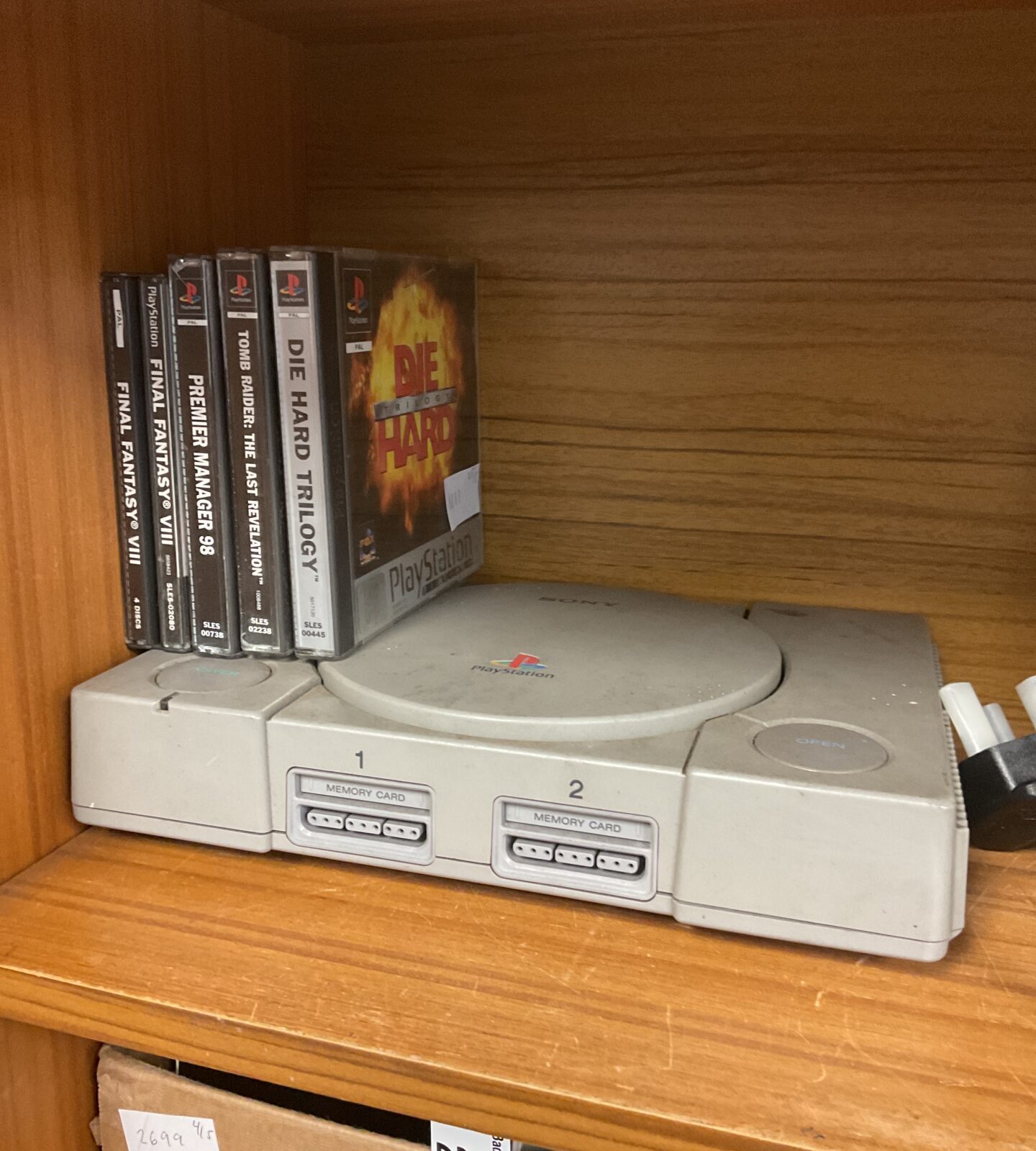 Sony PlayStation console with games (final fantasy missing 2 discs)