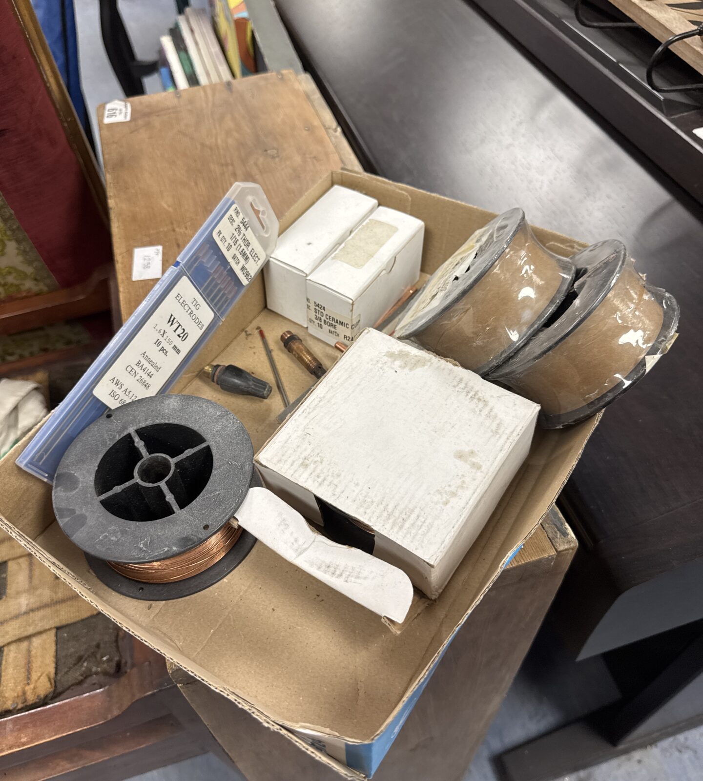 Tray of mixed items inc four rolls of mig welding wire