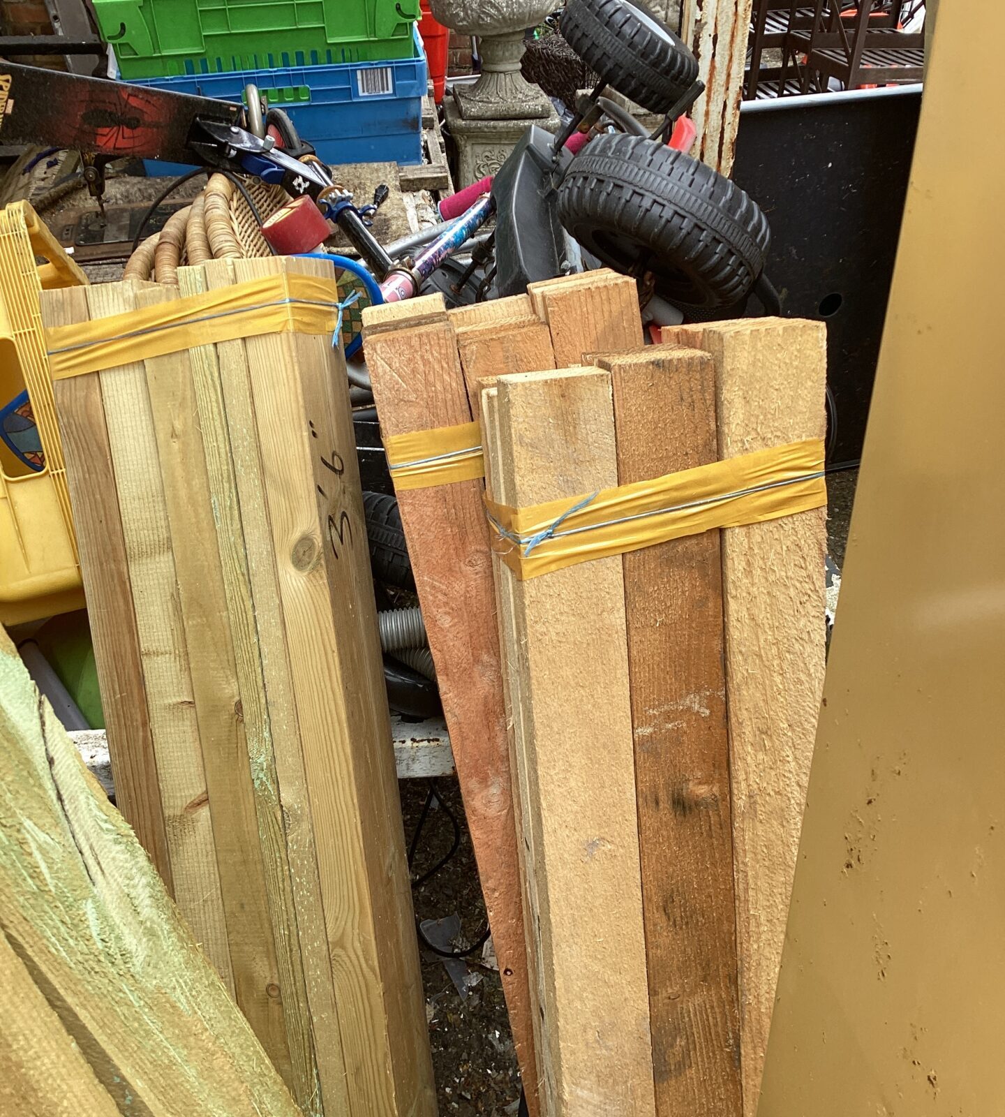 Three bundles of timber measuring 3’6”
