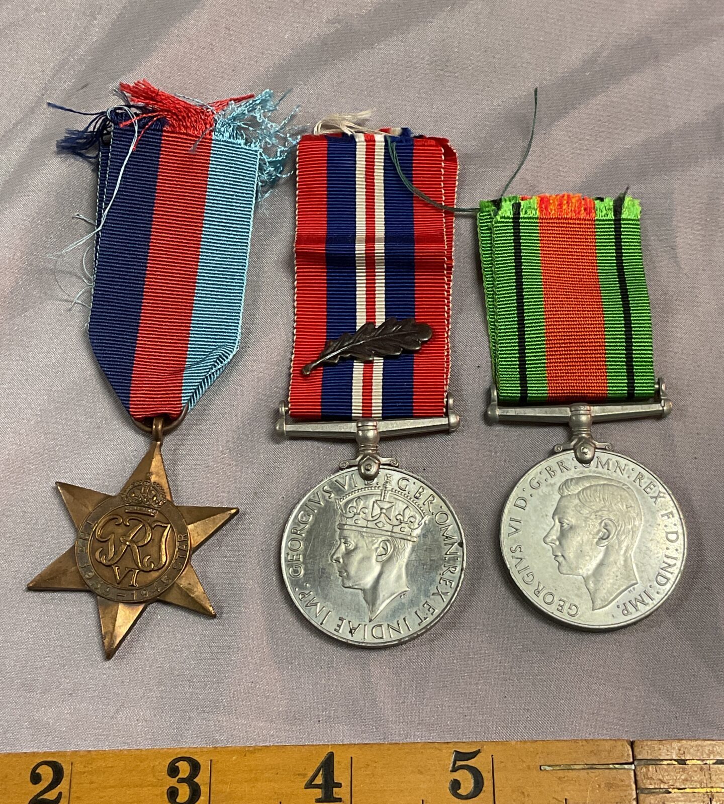 W W2 1939-45 Star, War Medal with Mid oak leaf and Defence medal