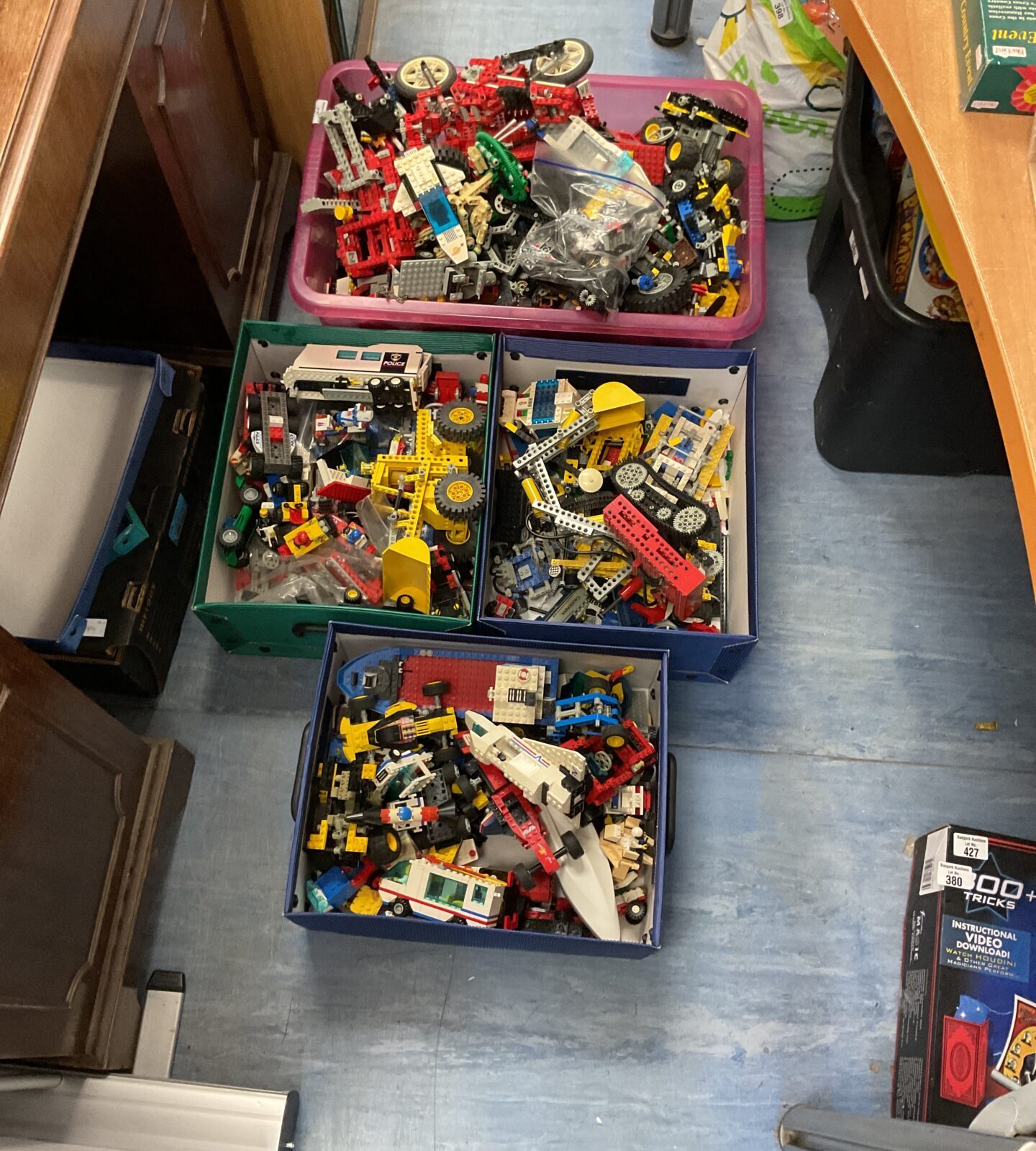 Four boxes of mixed vintage lego vehicles inc technics
