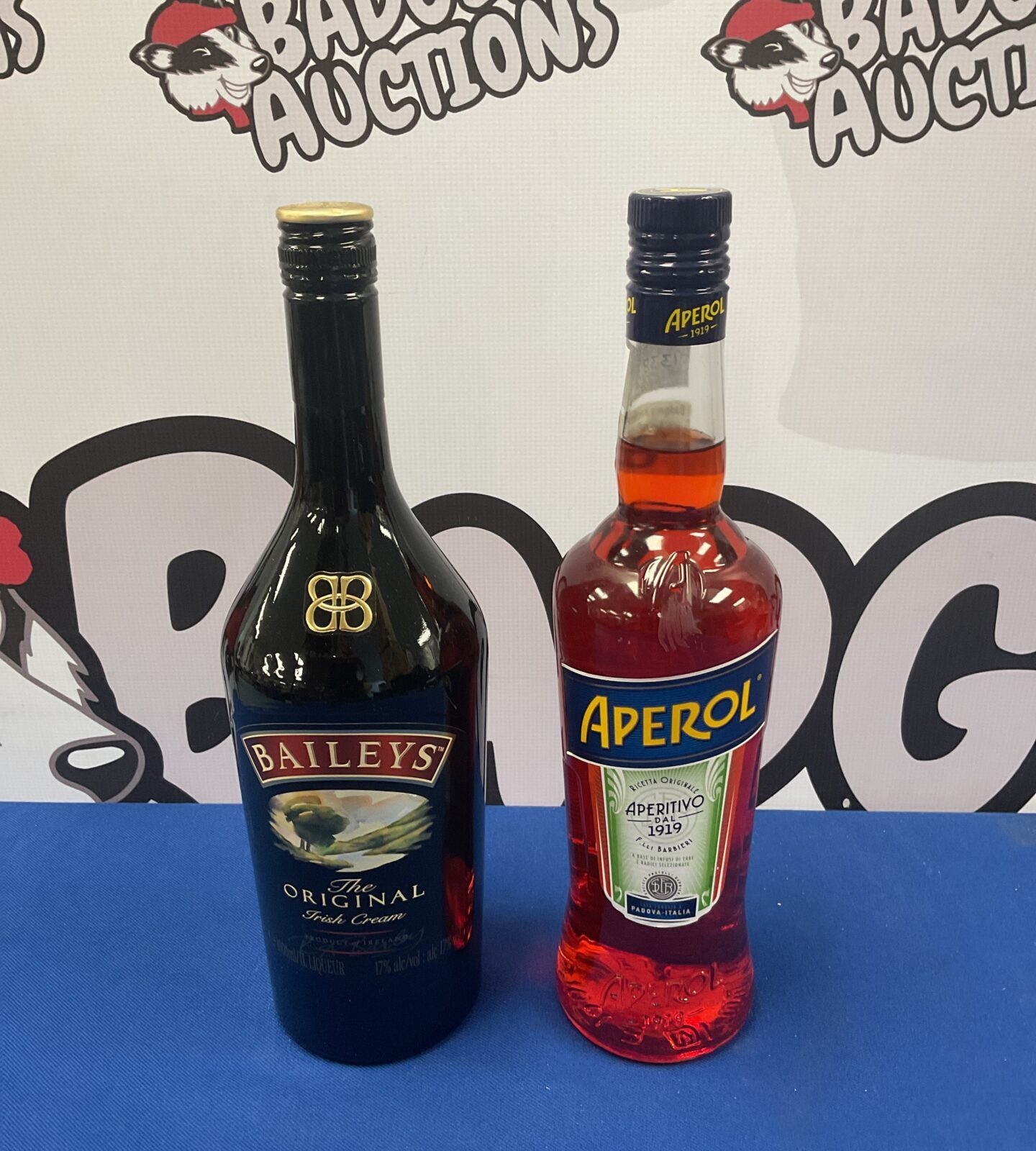 Sealed bottles of baileys irish cream & aperol