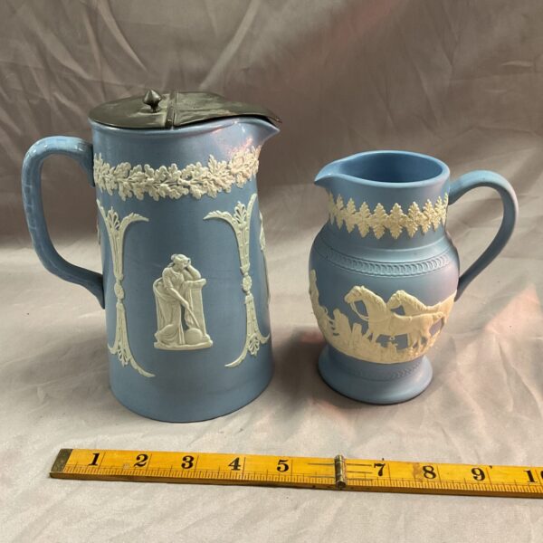 Two vintage dudson Jasperware Jugs one with pewter lid