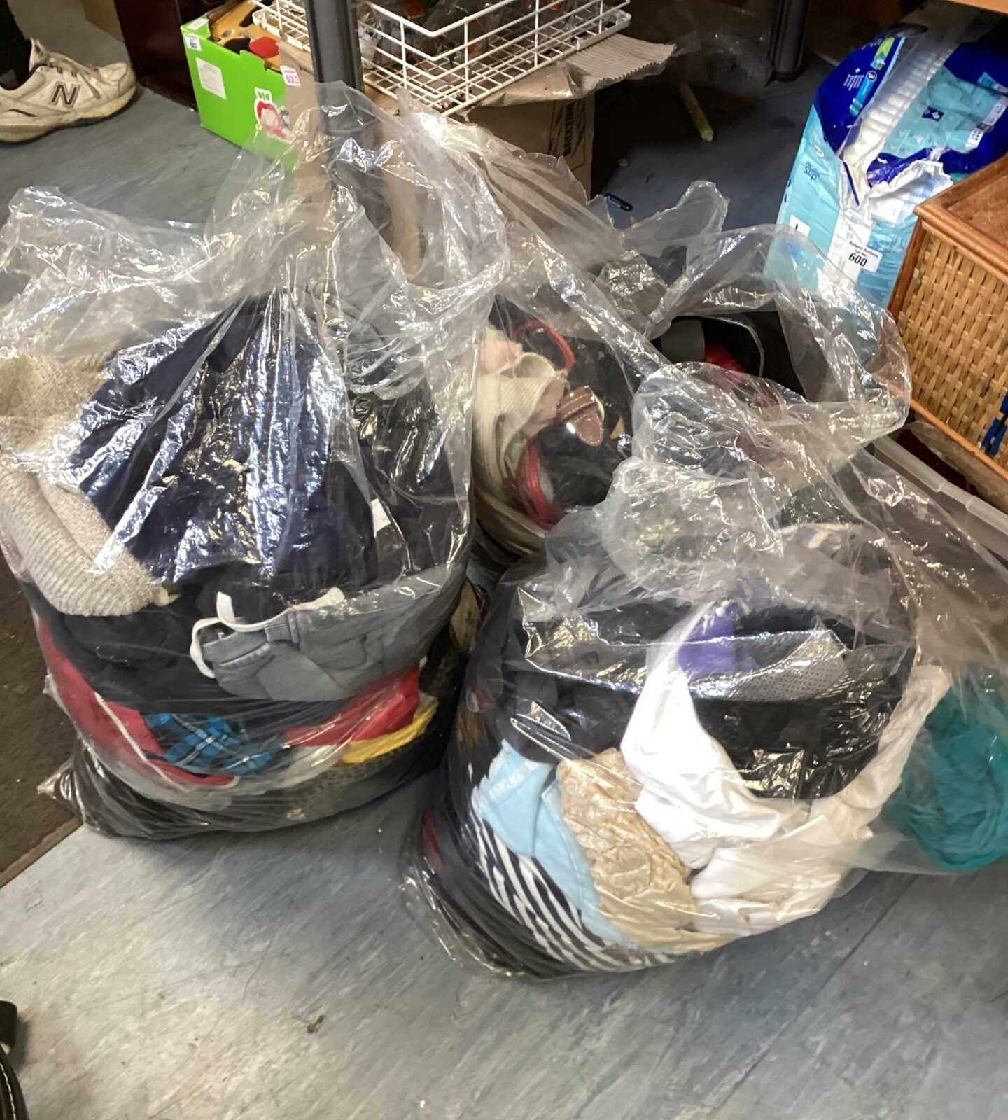 Three bags of mixed clothing