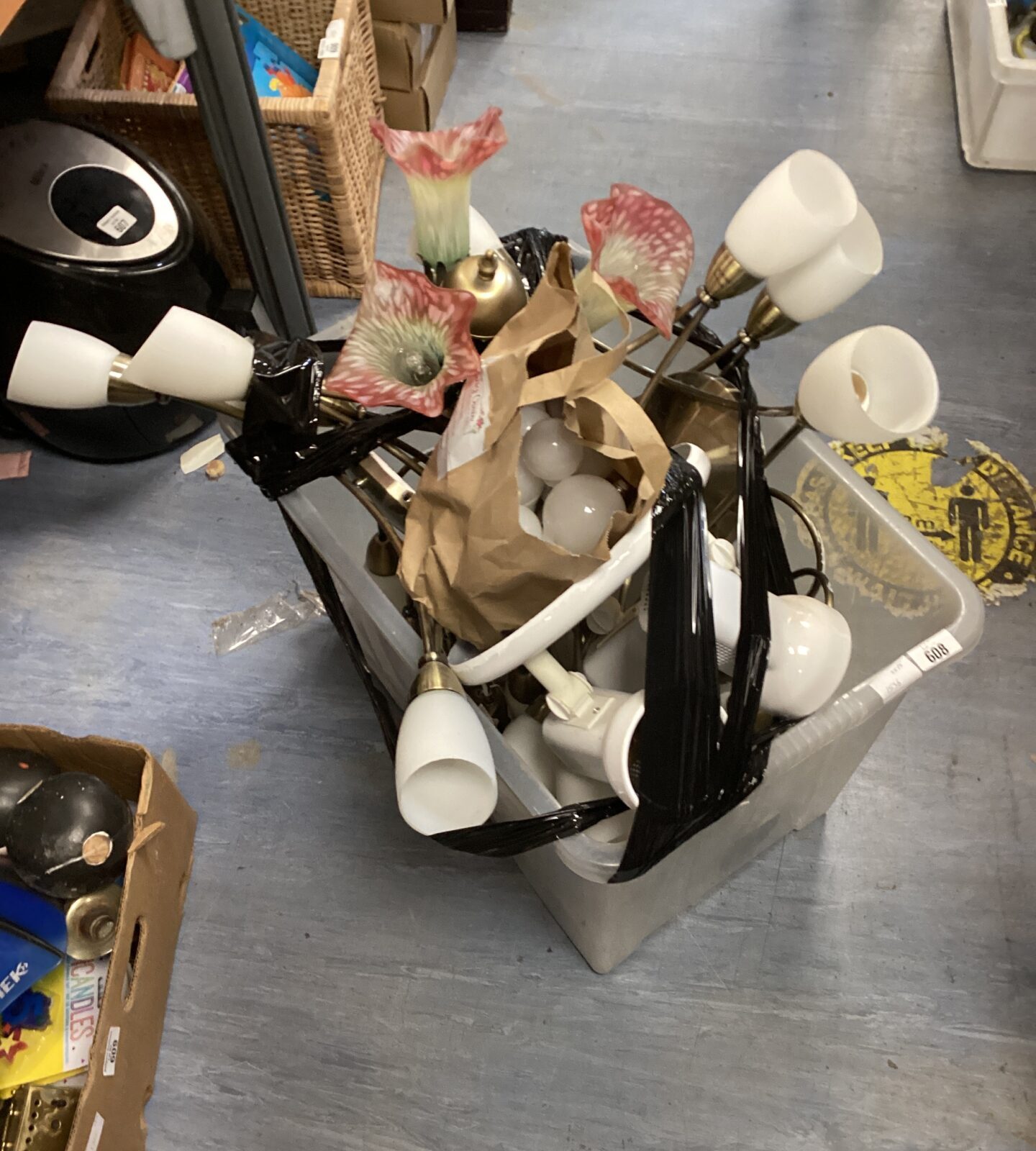Box of ceiling lights with bag of bulbs