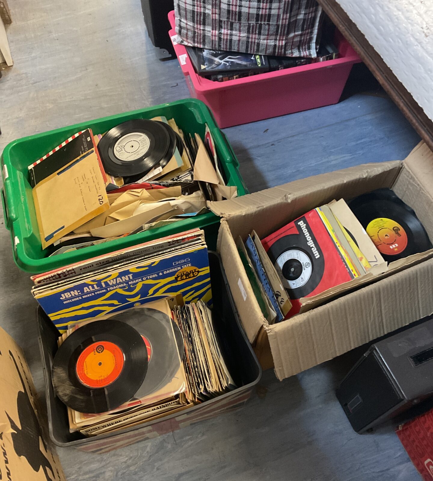 Three boxes of 7” single vinyl records