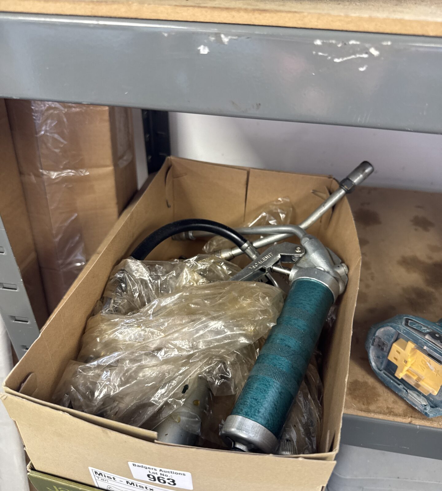 Three vintage grease guns