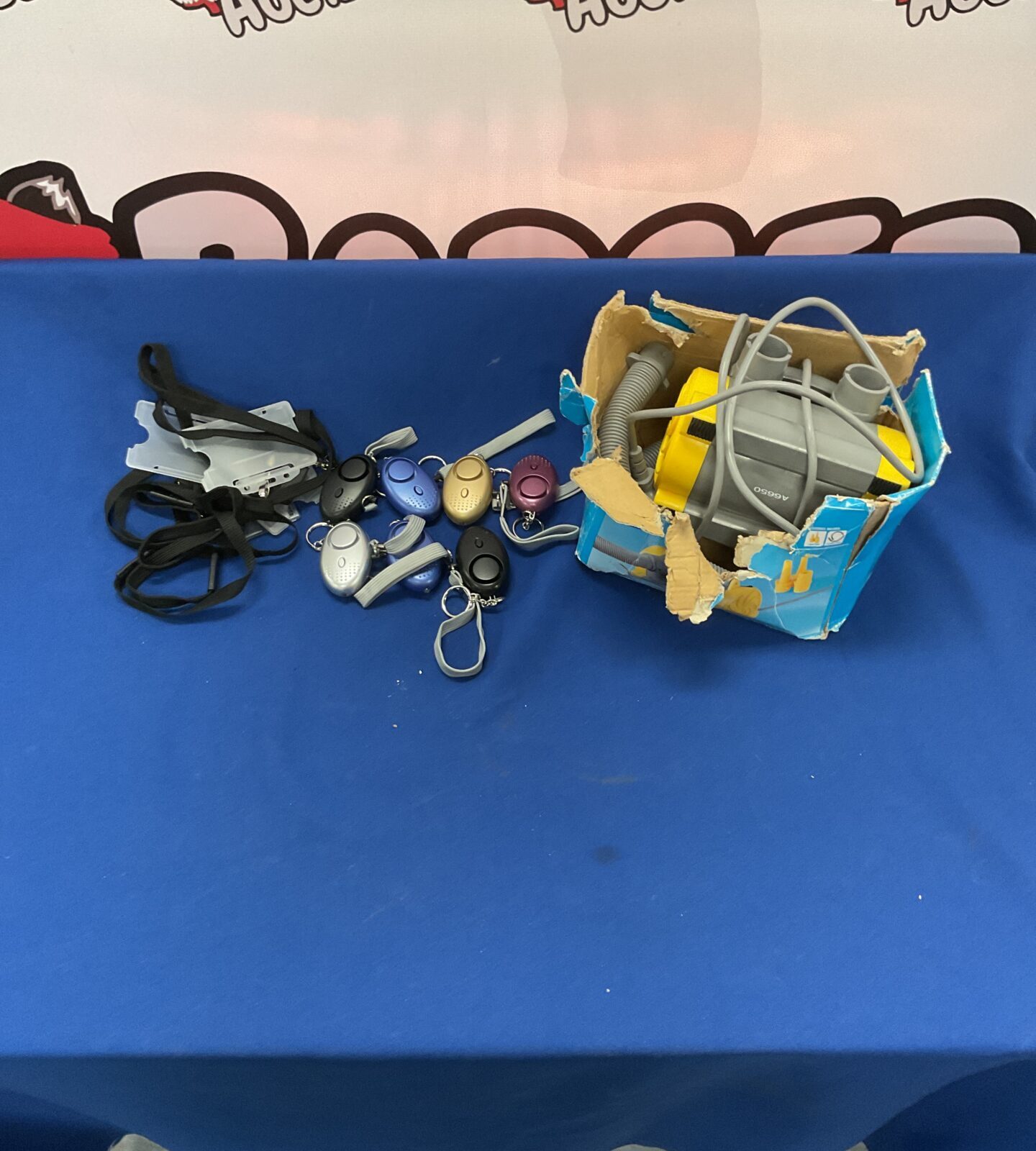 Box of mixed inc electric pump, personal alarms and lanyards