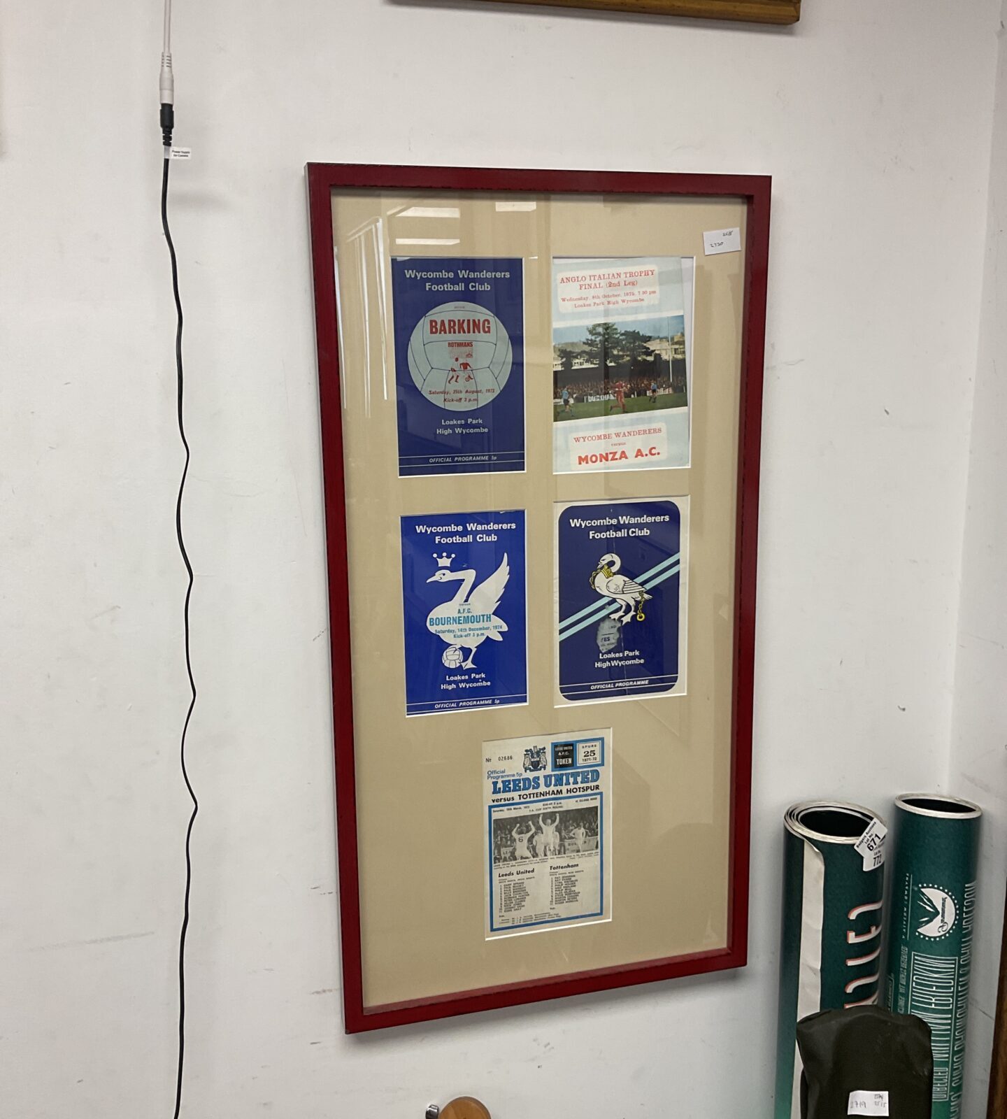 Framed set of 1970s football programmes including Wycombe wanderers & Leeds Utd
