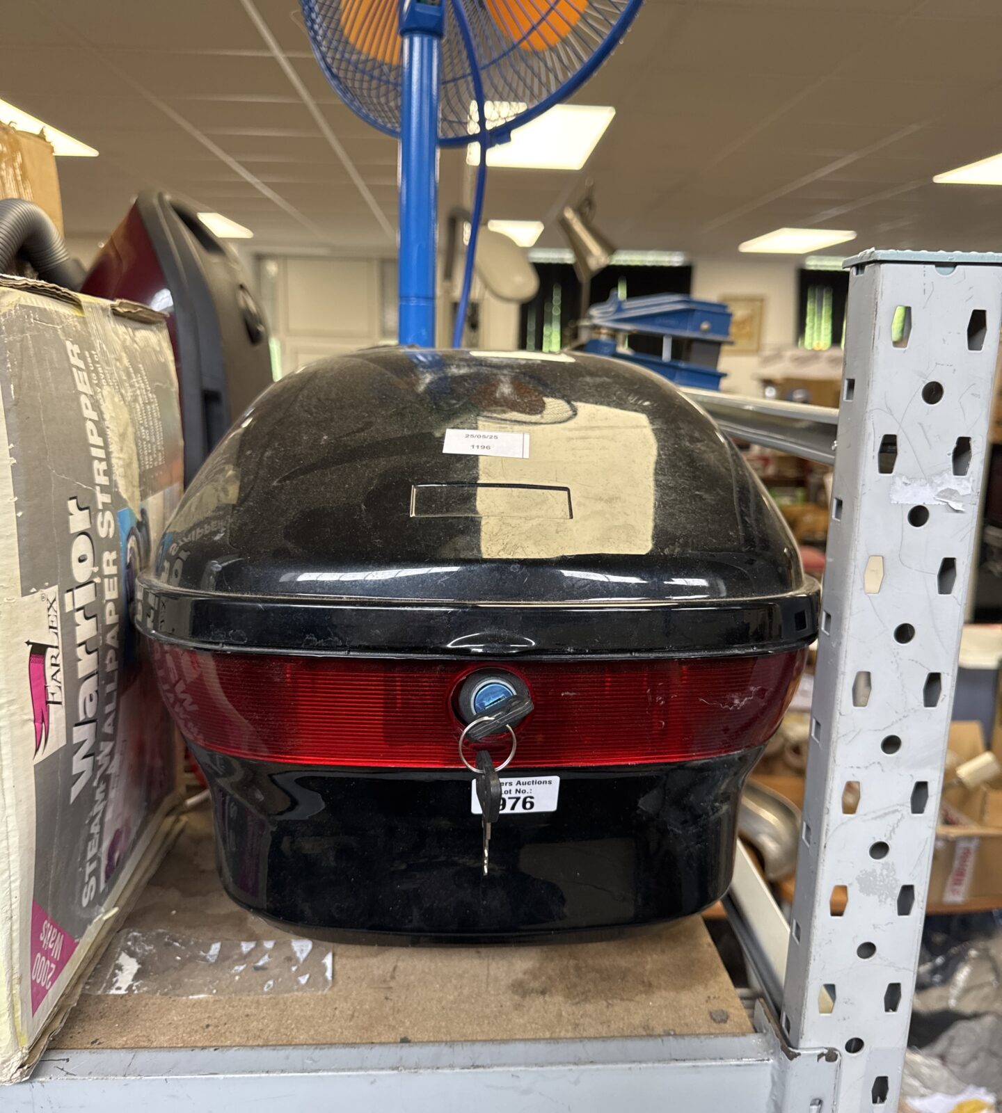 Motorcycle pillion box with keys