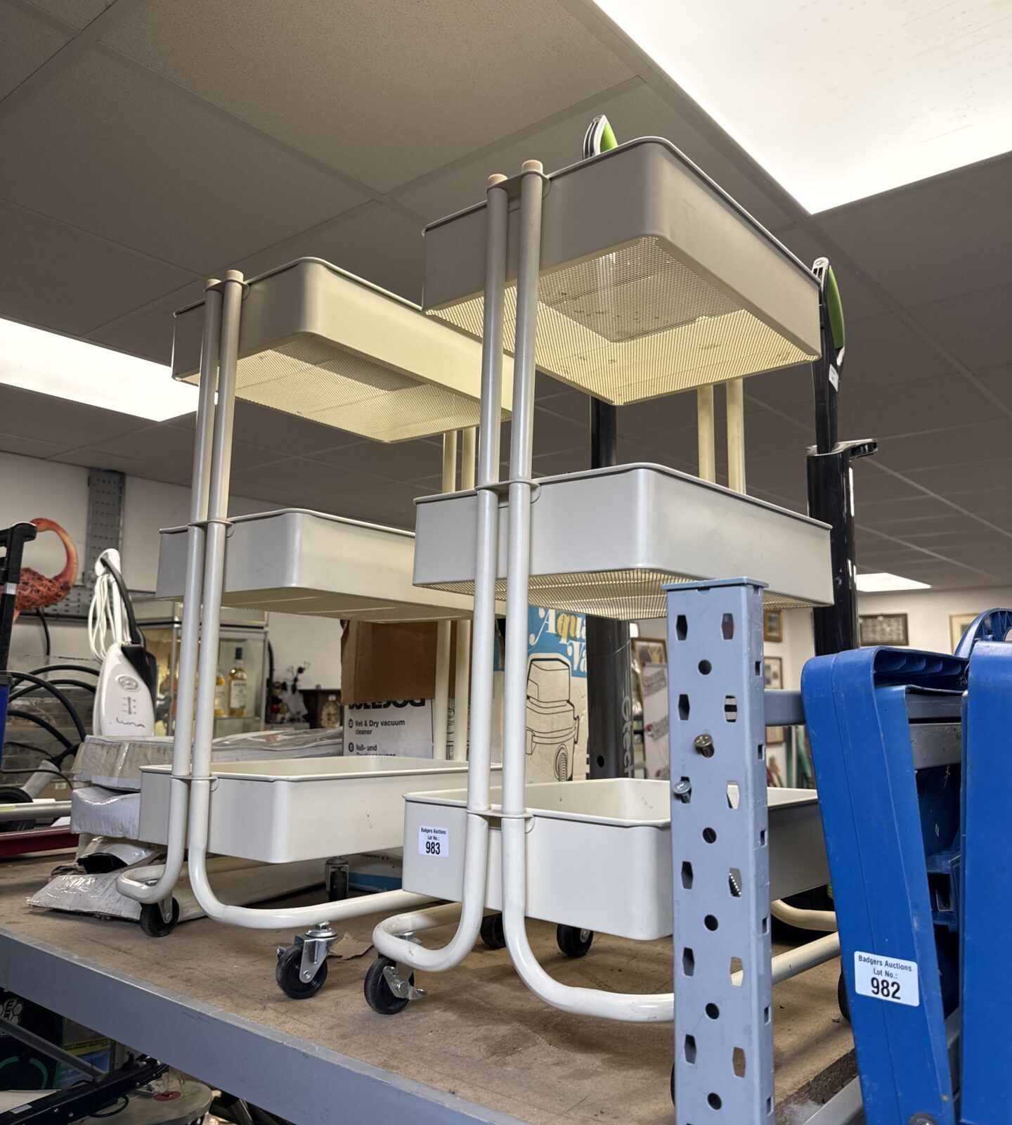 Two wheeled handy shelf units