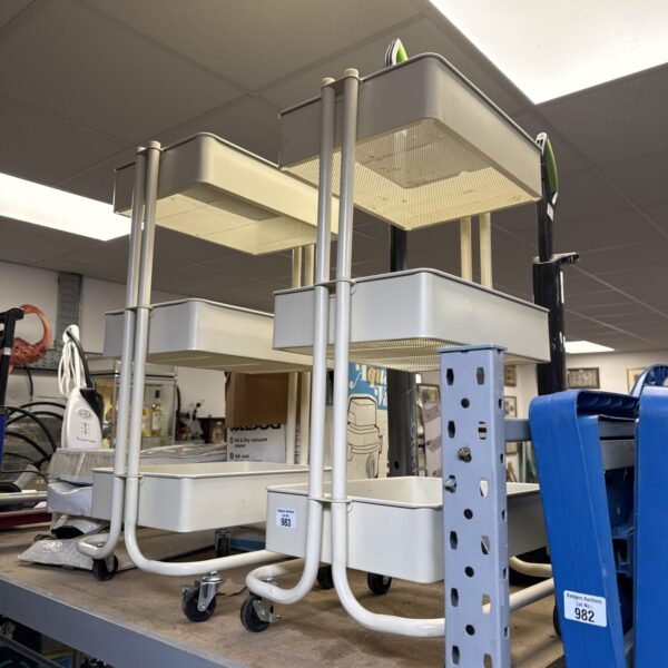 Two wheeled handy shelf units